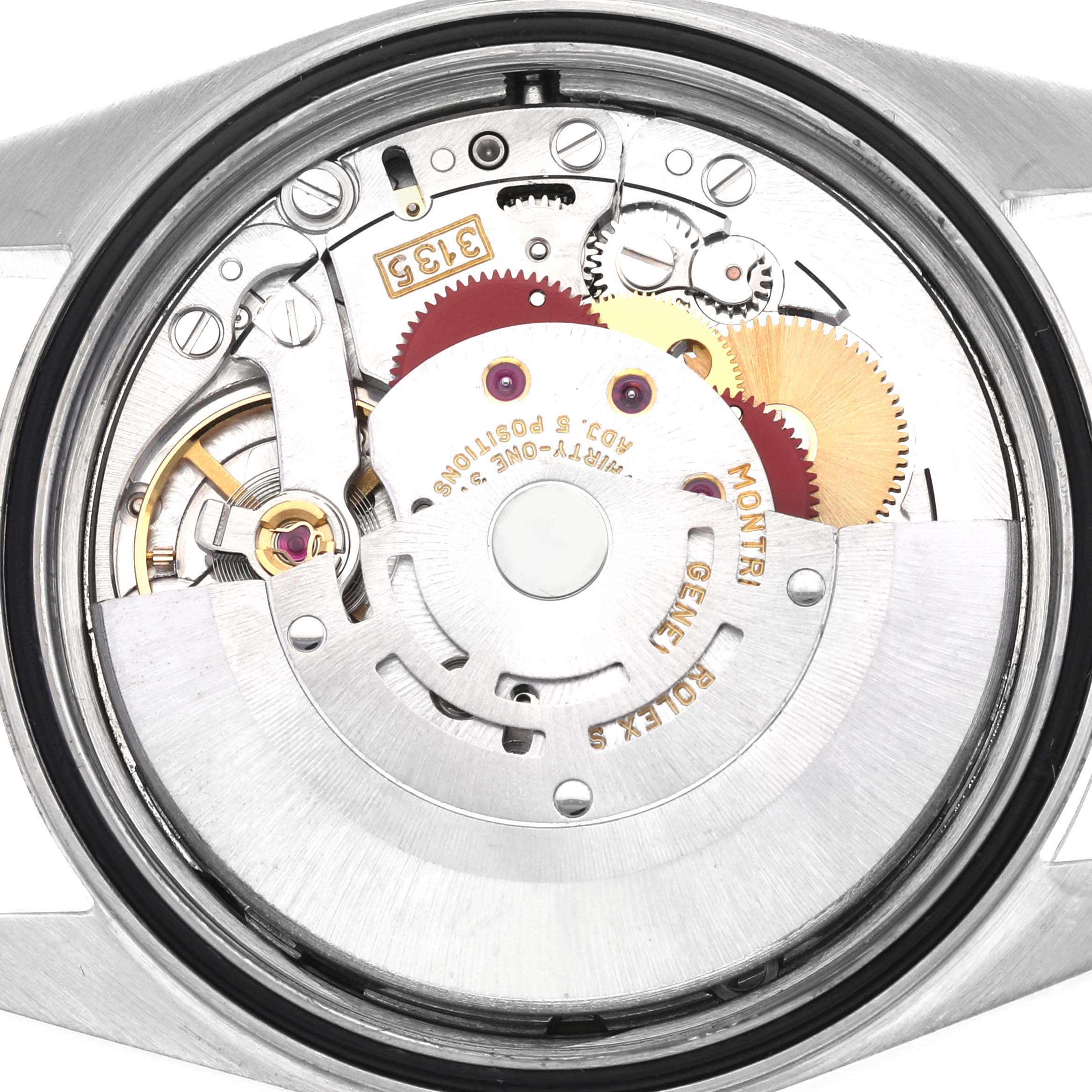 The image shows a close-up of the movement mechanism of the Rolex Datejust 16233 Men
s Steel and Gold (two tone) Champagne Dial 16233 Men
s Steel and Gold (two tone) Champagne Dial watch from the back.