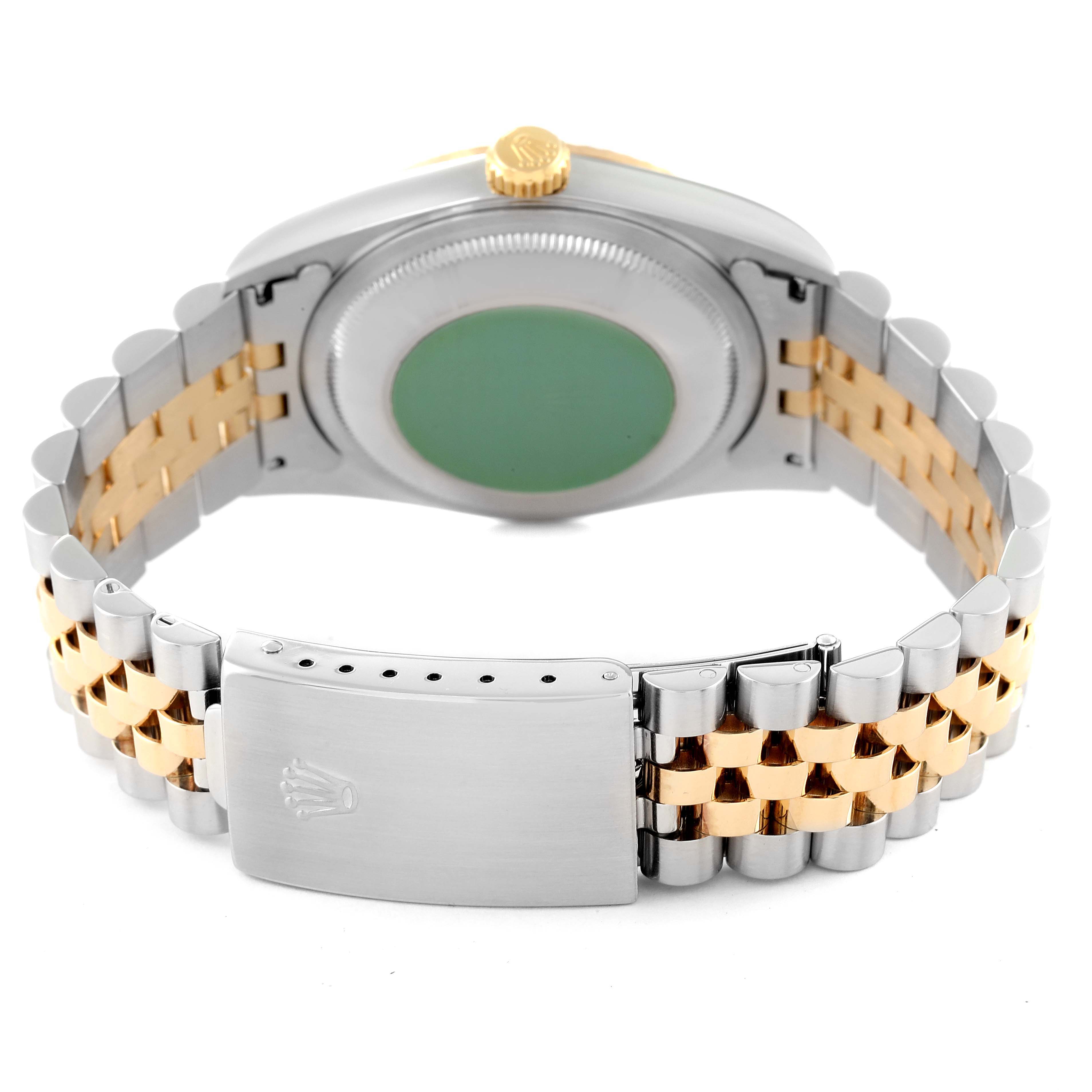 This image shows the back and bracelet of a Rolex Datejust 16233 Men's Steel and Gold (two tone) Champagne Dial 16233 Men's Steel and Gold (two tone) Champagne Dial watch, highlighting the clasp and case back.