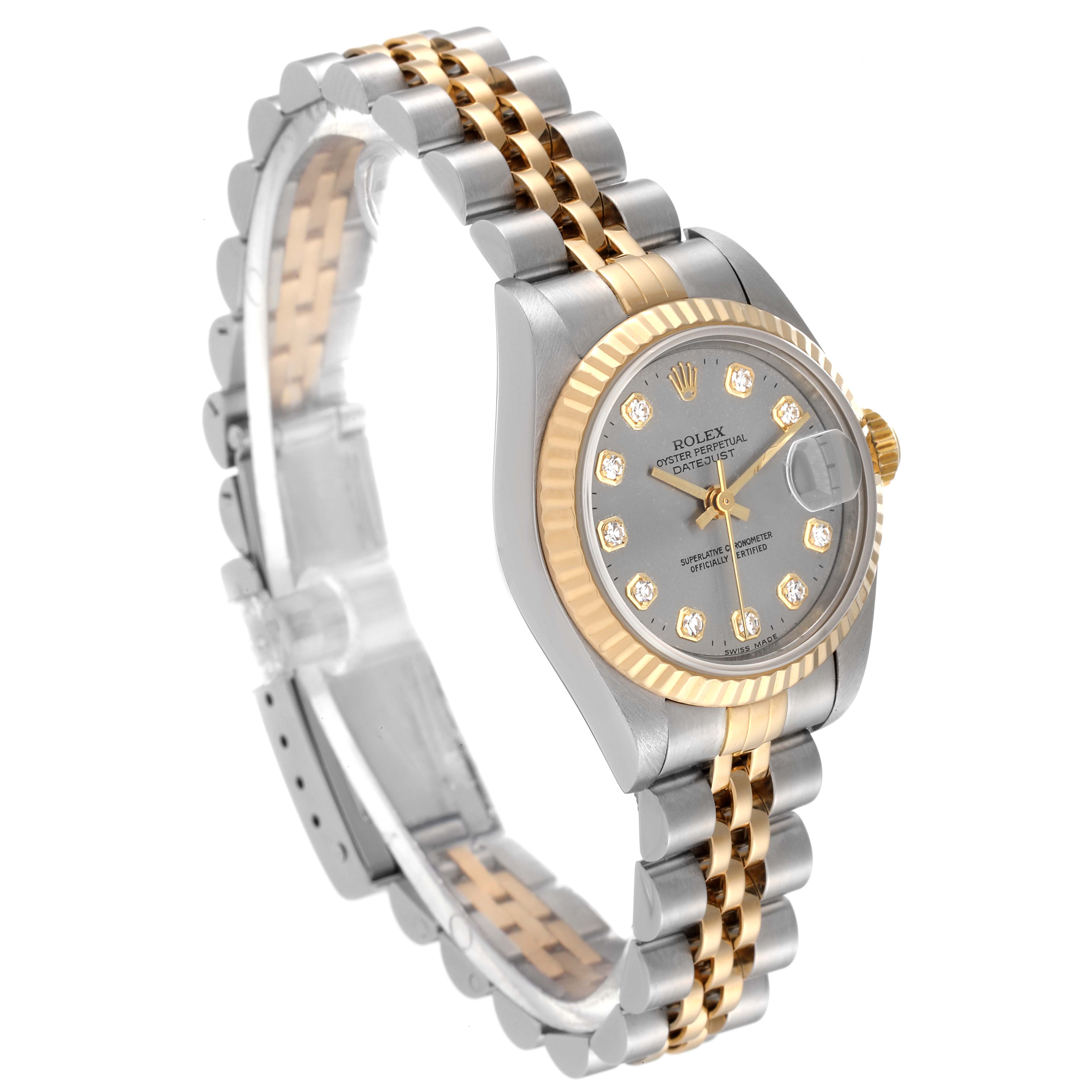 The Rolex Datejust 79173 Women's Steel and Gold (two tone) Grey Dial 79173 Women's Steel and Gold (two tone) Grey Dial watch is shown at an angled view, highlighting its two-tone bracelet, diamond-encrusted dial, and fluted bezel.