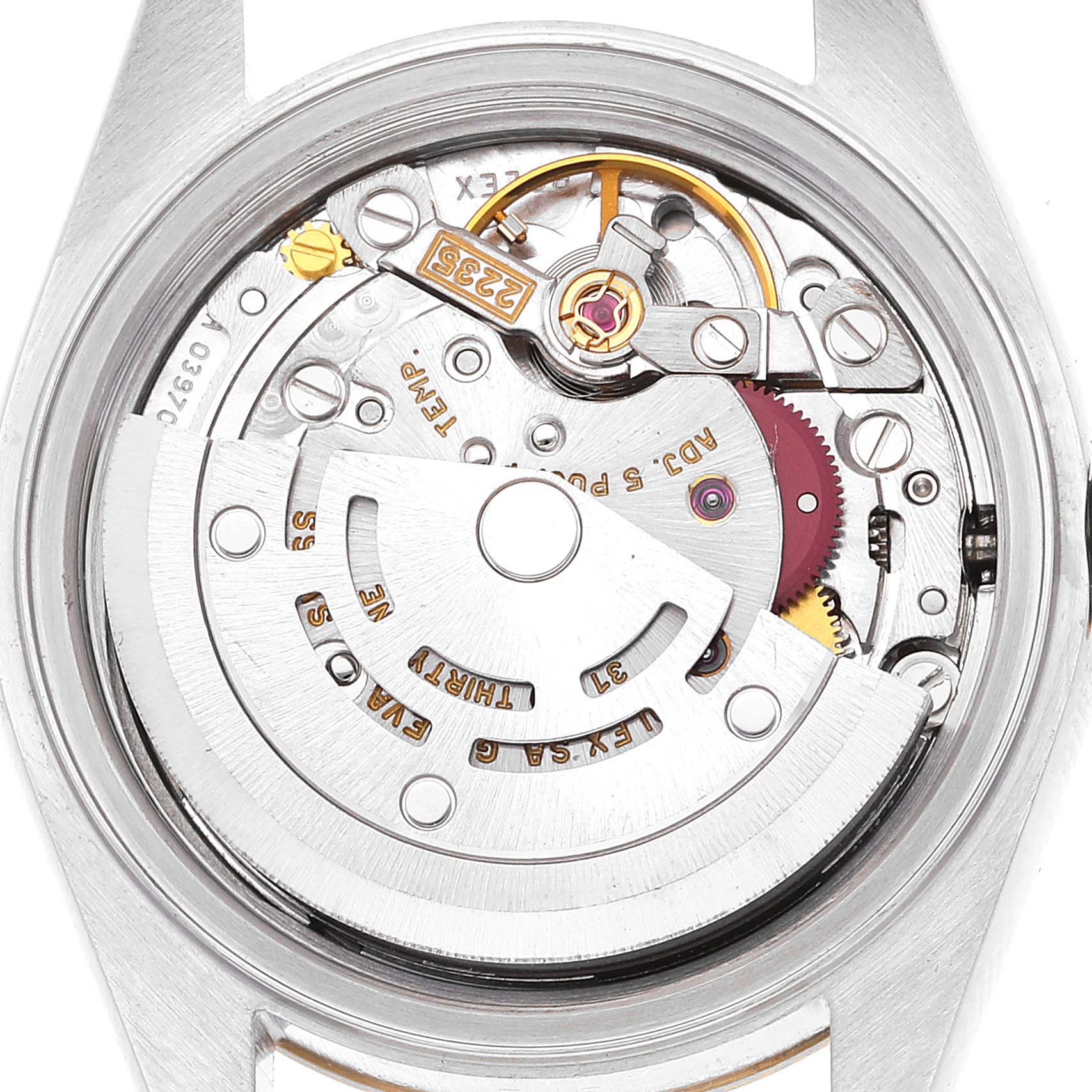 This image shows the back view of a Rolex Datejust 79173 Women's Steel and Gold (two tone) Grey Dial 79173 Women's Steel and Gold (two tone) Grey Dial watch, highlighting its mechanical movement parts.