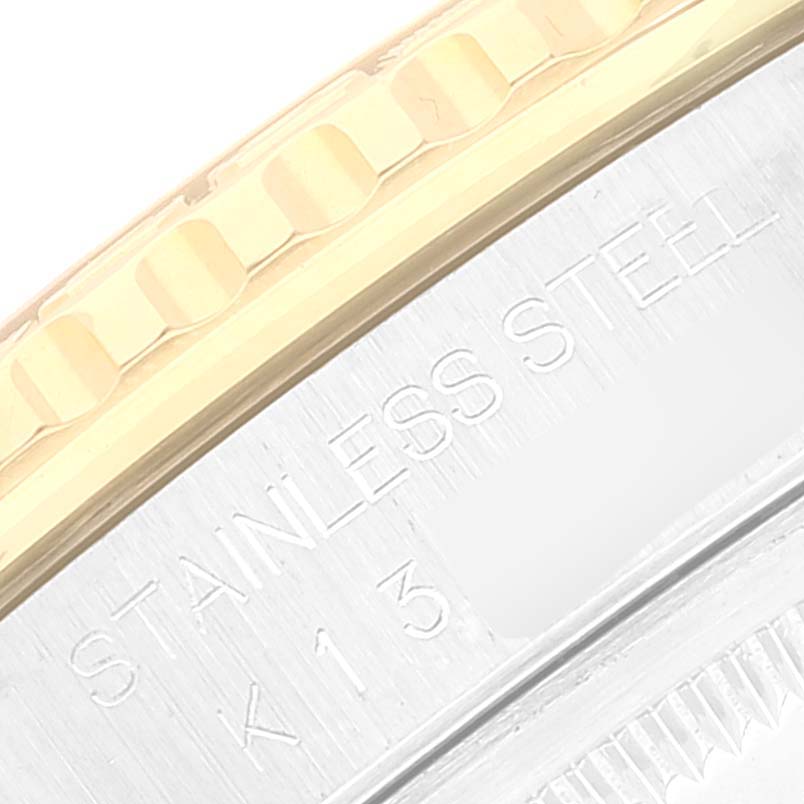 The image shows a close-up of the bezel and engraved stainless steel on a Rolex Turn-o-Graph 16263 Men's Steel and Gold (two tone) Black Dial 16263 Men's Steel and Gold (two tone) Black Dial watch.