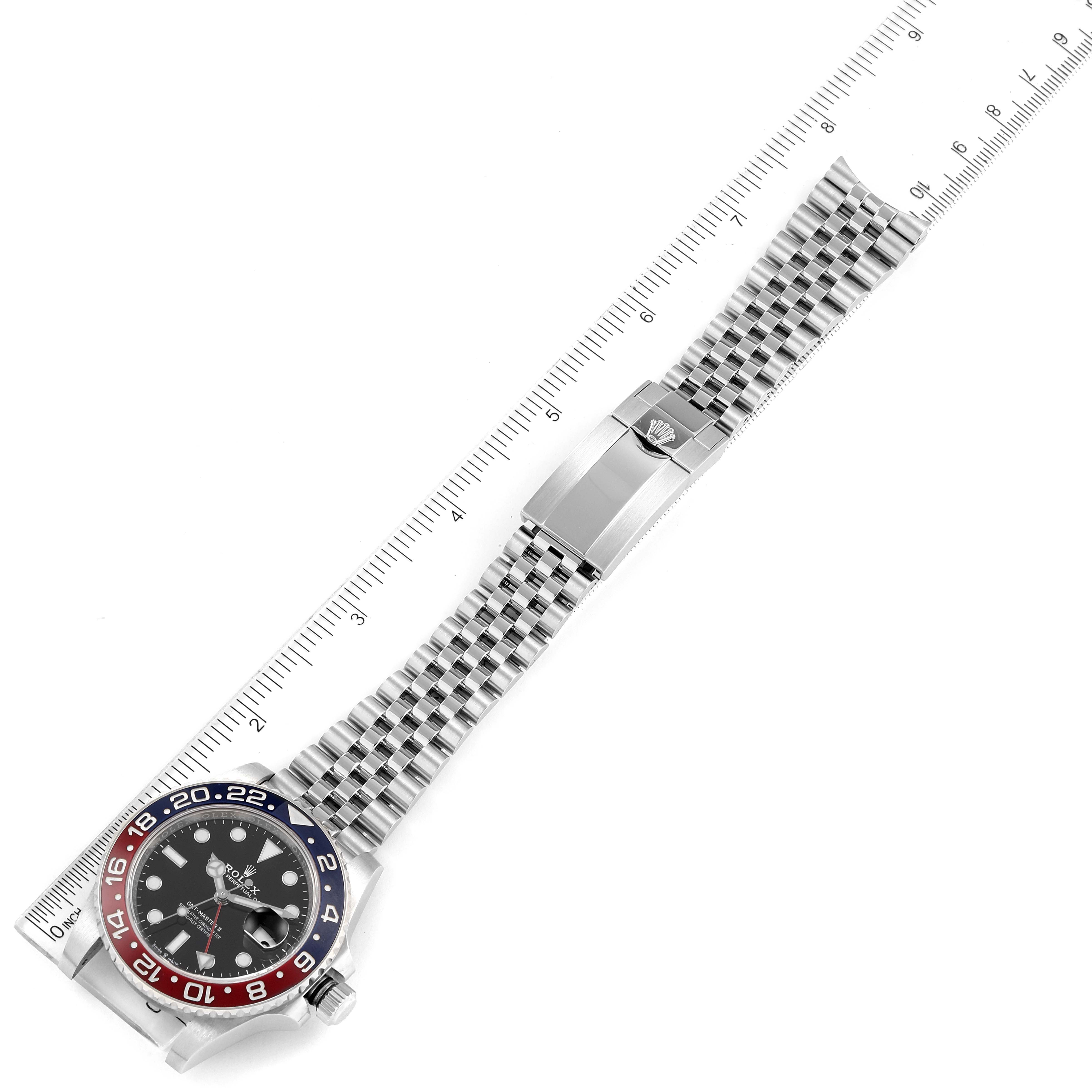 This image shows the Rolex GMT-Master 126710 Men's Stainless Steel Black Dial 126710 Men's Stainless Steel Black Dial watch laid flat with its bracelet and clasp visible.