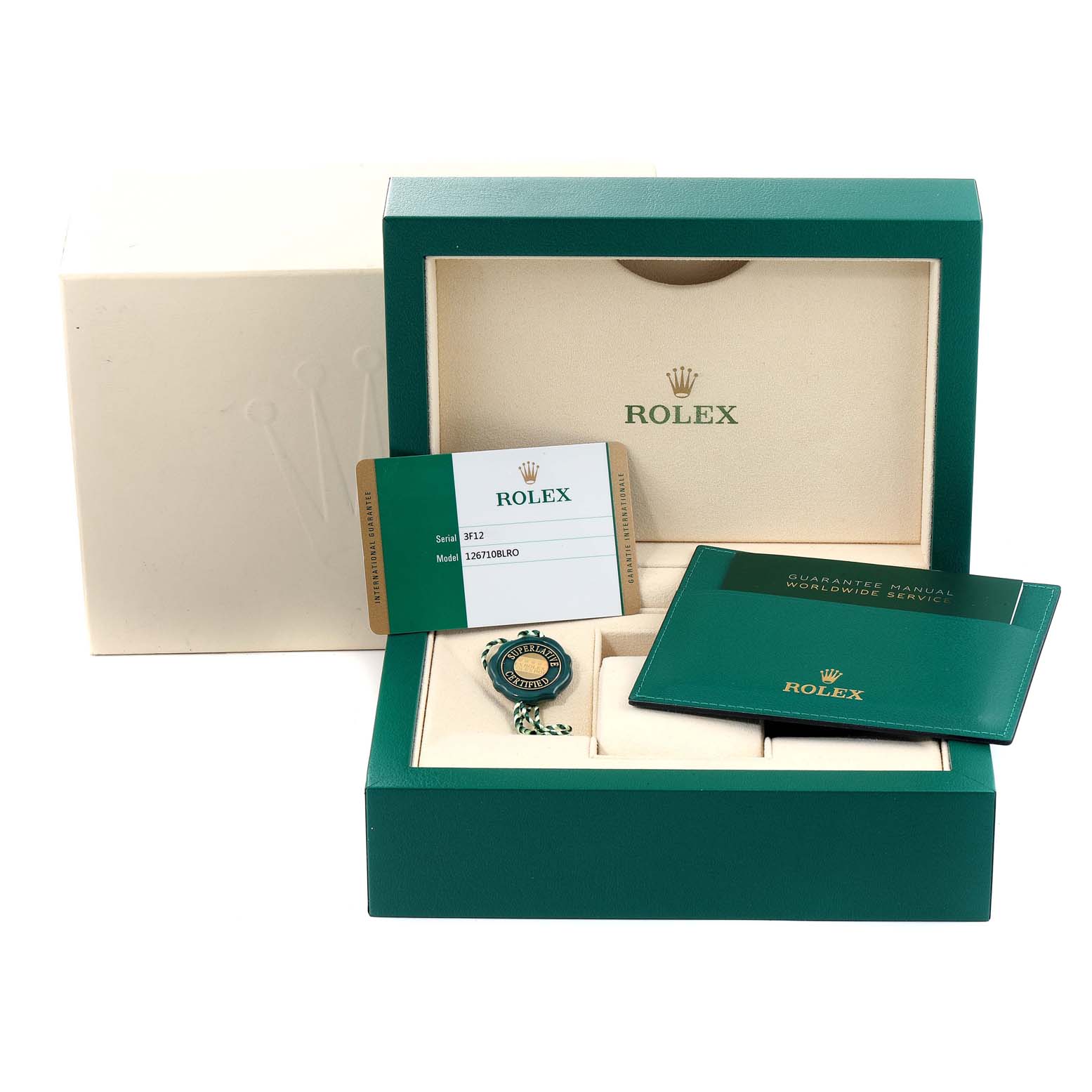 The image shows the accessories of a Rolex GMT-Master 126710 Men's Stainless Steel Black Dial 126710 Men's Stainless Steel Black Dial, including a box, guarantee manual, warranty card, and tag.