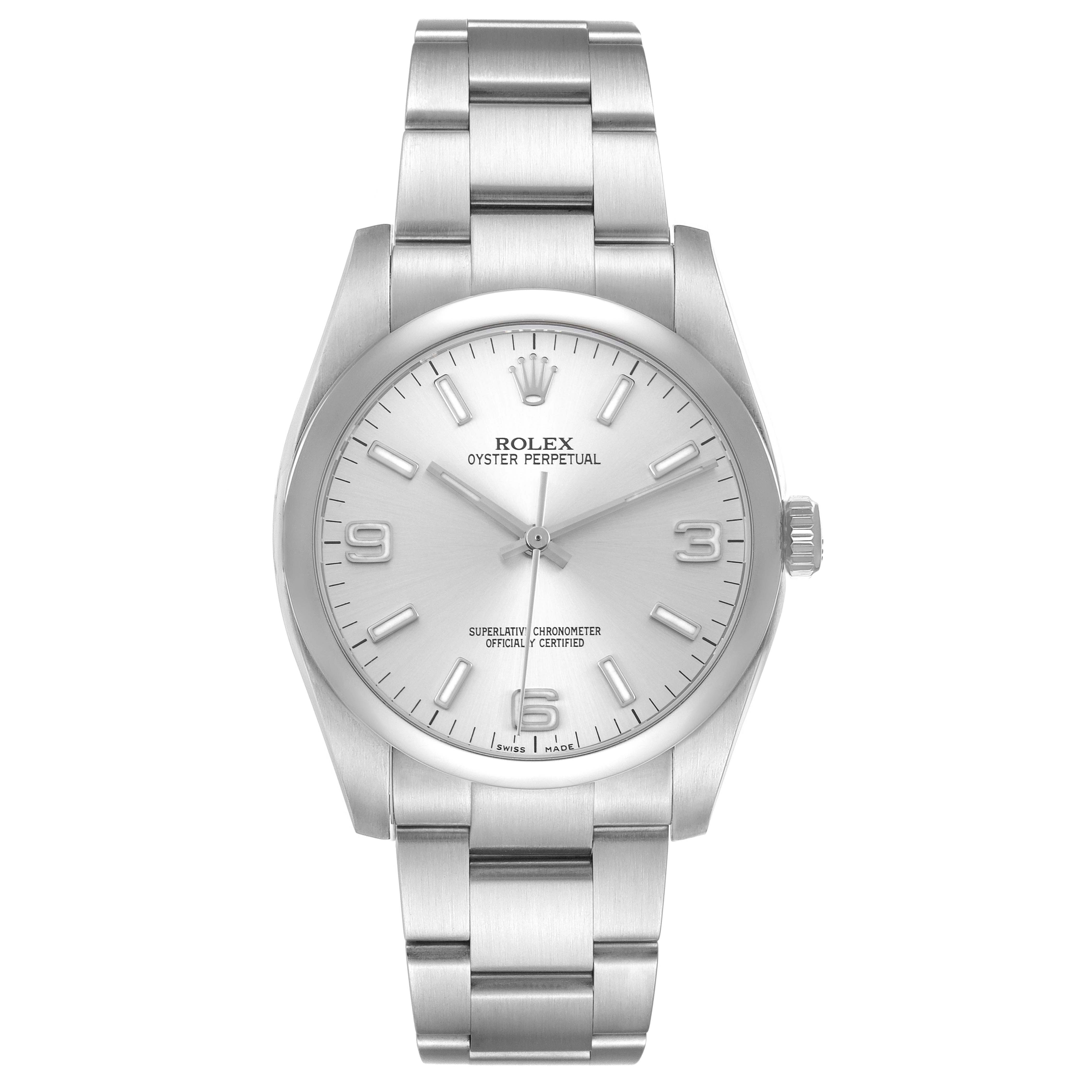 The Rolex Oyster Perpetual 116000 Men's Stainless Steel Silver Dial 116000 Men's Stainless Steel Silver Dial watch is shown from a front angle, highlighting the face, bracelet, and crown.