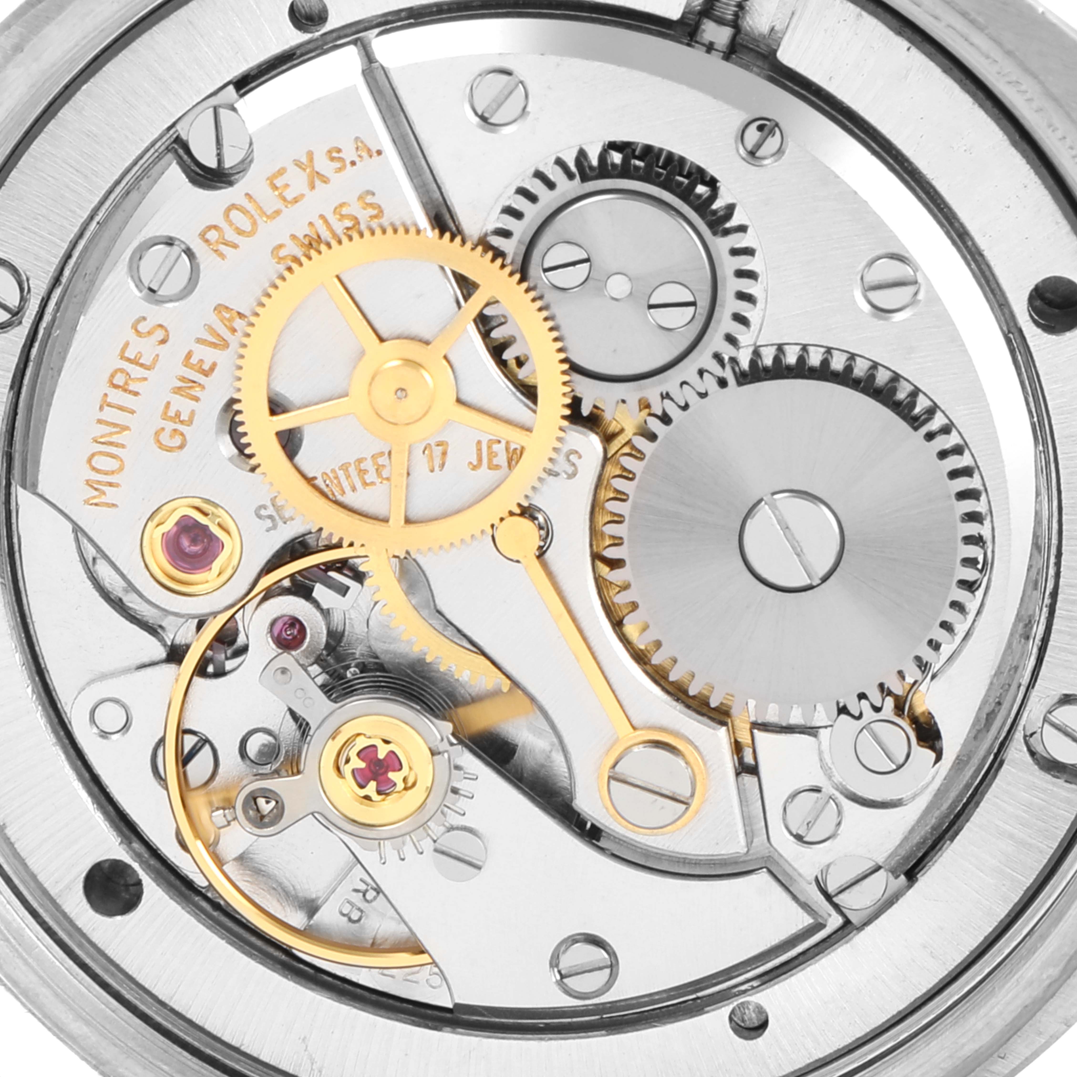 This image shows the internal mechanics of a Rolex Vintage Collection 6694 Men's Stainless Steel Silver Dial 6694 Men's Stainless Steel Silver Dial watch, including gears and screws.