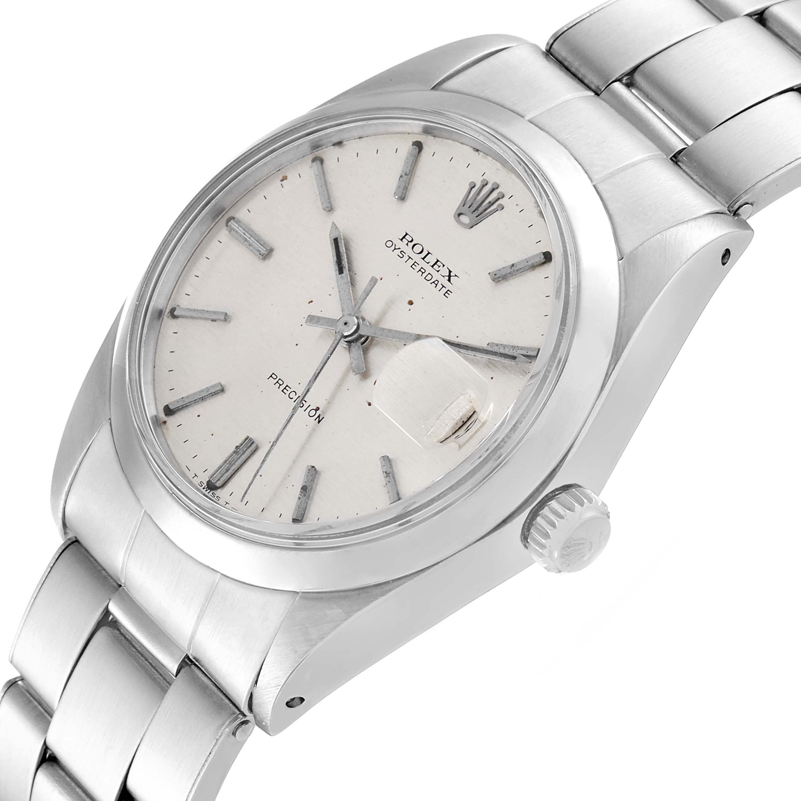 The image shows a side and partial top view of the Rolex Vintage Collection 6694 Men's Stainless Steel Silver Dial 6694 Men's Stainless Steel Silver Dial Oysterdate Precision watch, highlighting the dial, crown, and bracelet.
