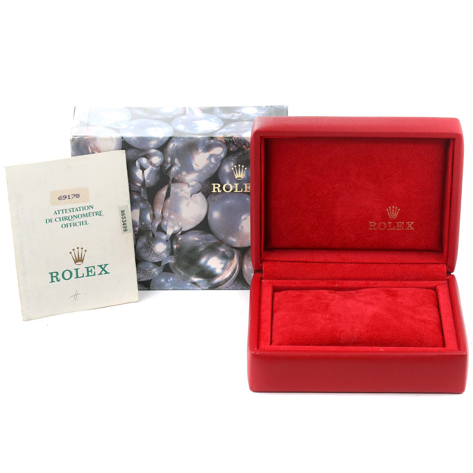 The image shows a red Rolex President 69178 Women's Yellow Gold Champagne Dial 69178 Women's Yellow Gold Champagne Dial model watch box, outer packaging, and a certification booklet.