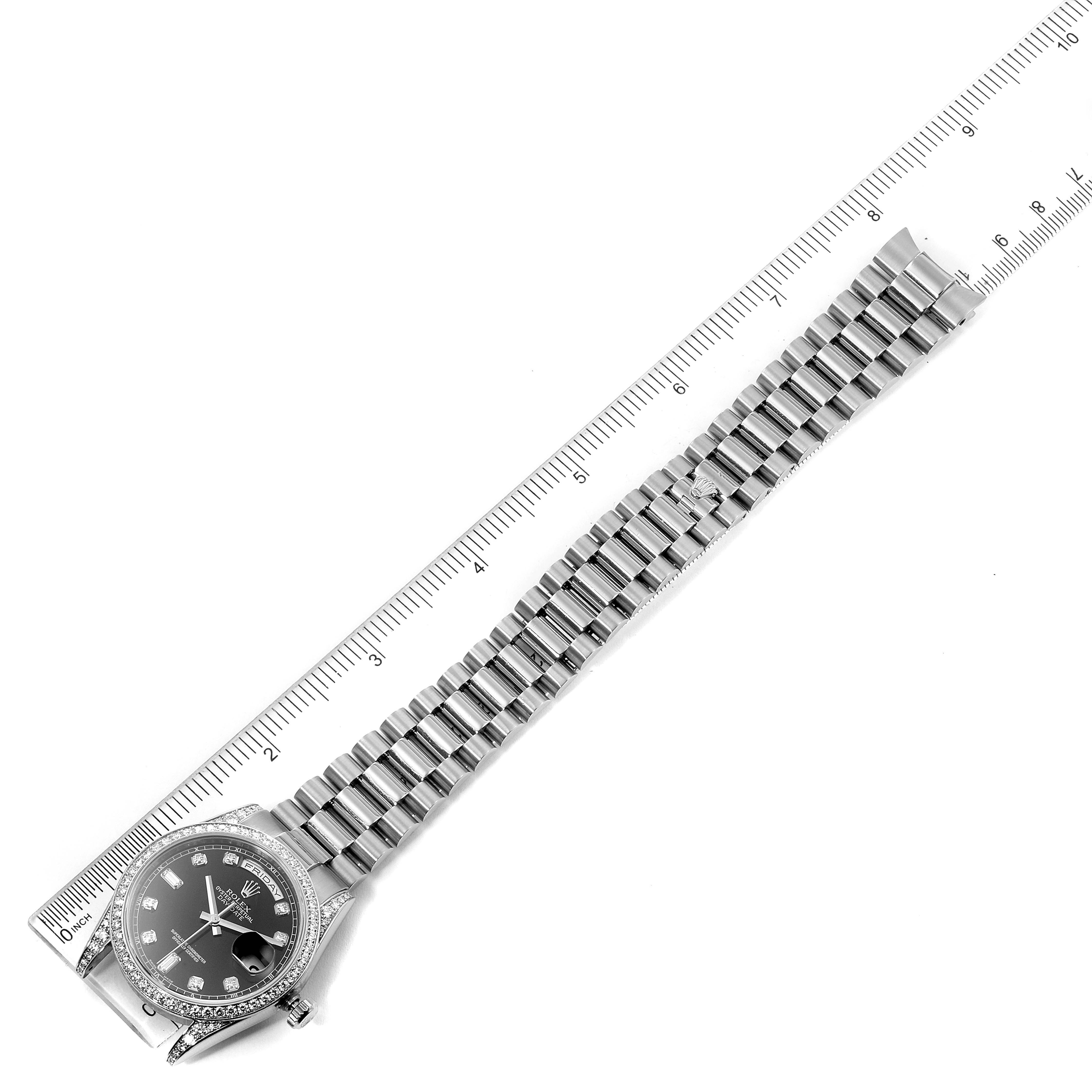 The image shows a Rolex President 118339 Men's White Gold Black Dial 118339 Men's White Gold Black Dial model watch laid flat with its bracelet extended and measured against a ruler.