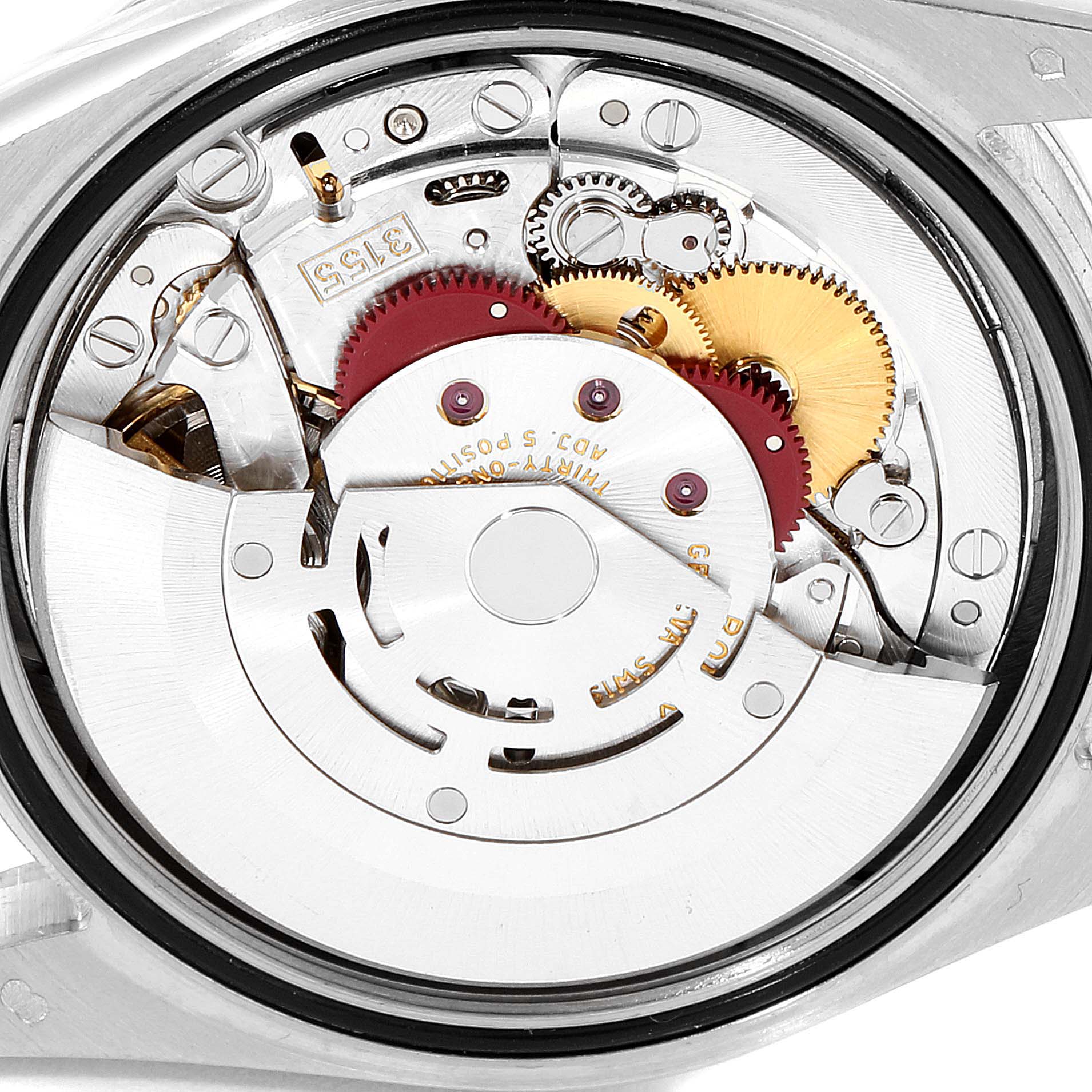 The image shows the internal mechanism and parts of a President model Rolex watch from a top-down angle.