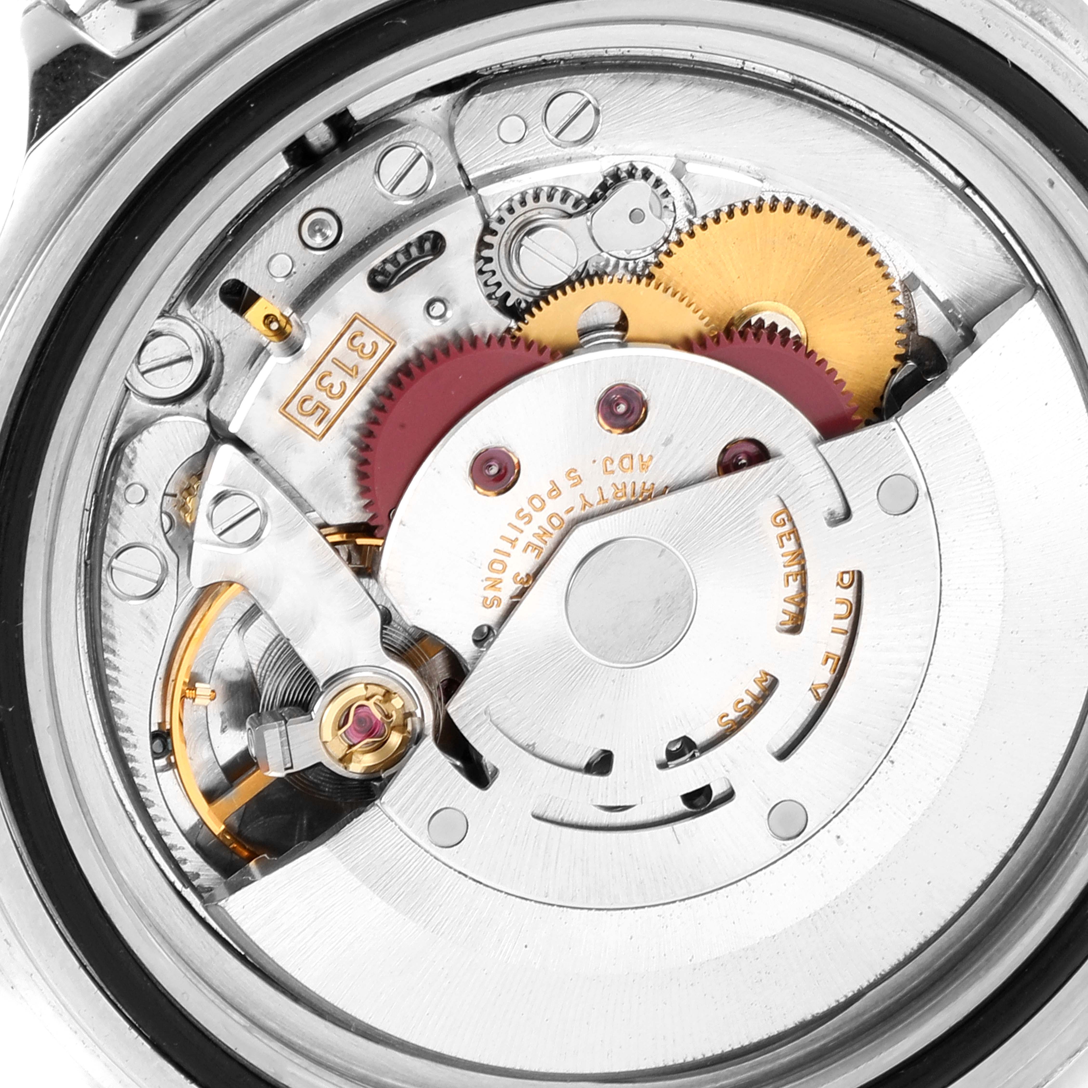 This image shows the inner mechanical movement of a Rolex Submariner 16610 Men's Stainless Steel Black Dial 16610 Men's Stainless Steel Black Dial watch from a close-up angle.