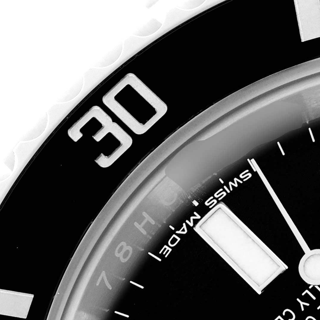 The image shows a close-up of the bezel and part of the dial of a Rolex Submariner 116610LN Men's Stainless Steel Black Dial 116610LN Men's Stainless Steel Black Dial, focusing on the "30" mark.