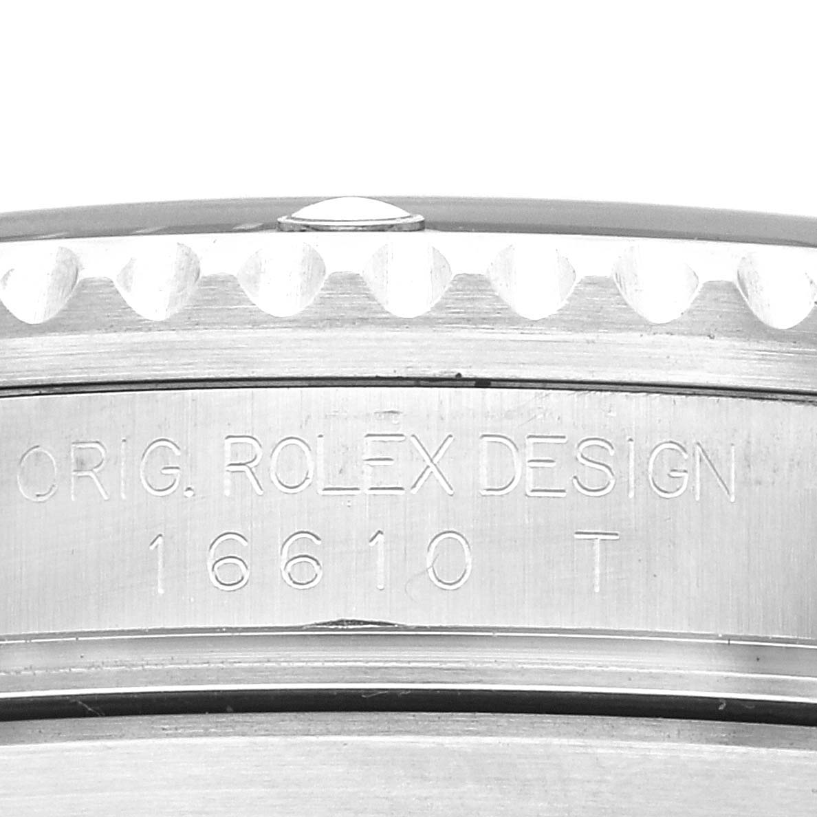 The image shows a close-up of the side of the case with engraving details on a Rolex Submariner 16610T Men's Stainless Steel Black Dial 16610T Men's Stainless Steel Black Dial watch.