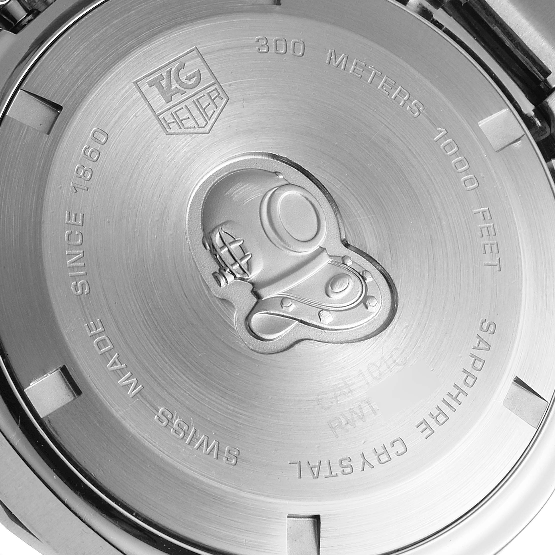 This image shows the stainless steel case back of a Tag Heuer Aquaracer CAF101C.BA0821 Men's Stainless Steel Blue Dial CAF101C.BA0821 Men's Stainless Steel Blue Dial watch, engraved with depth rating and a diver's helmet.