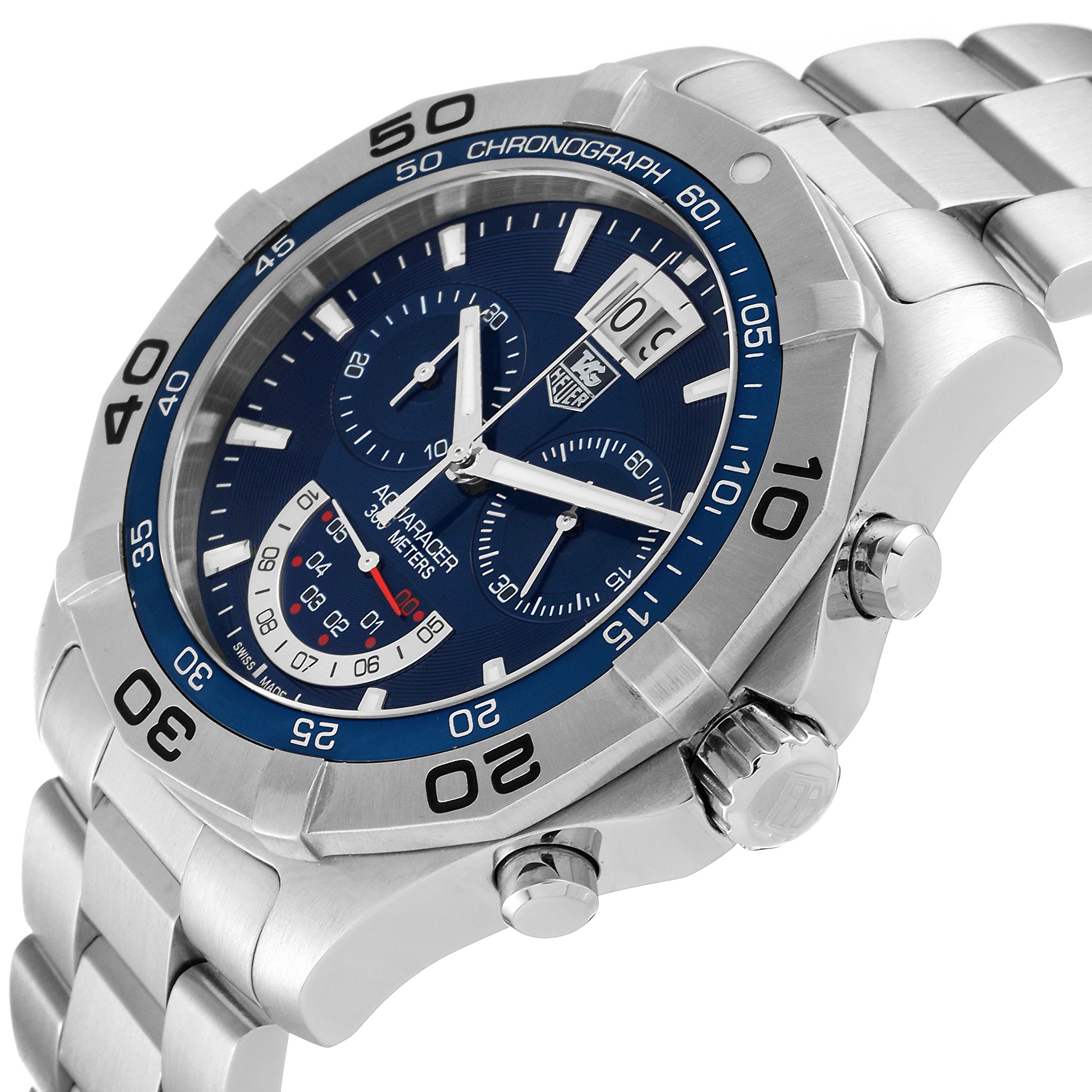 The image shows the Tag Heuer Aquaracer CAF101C.BA0821 Men's Stainless Steel Blue Dial CAF101C.BA0821 Men's Stainless Steel Blue Dial watch from an angled side view, highlighting its bezel, dial, and chronograph buttons.
