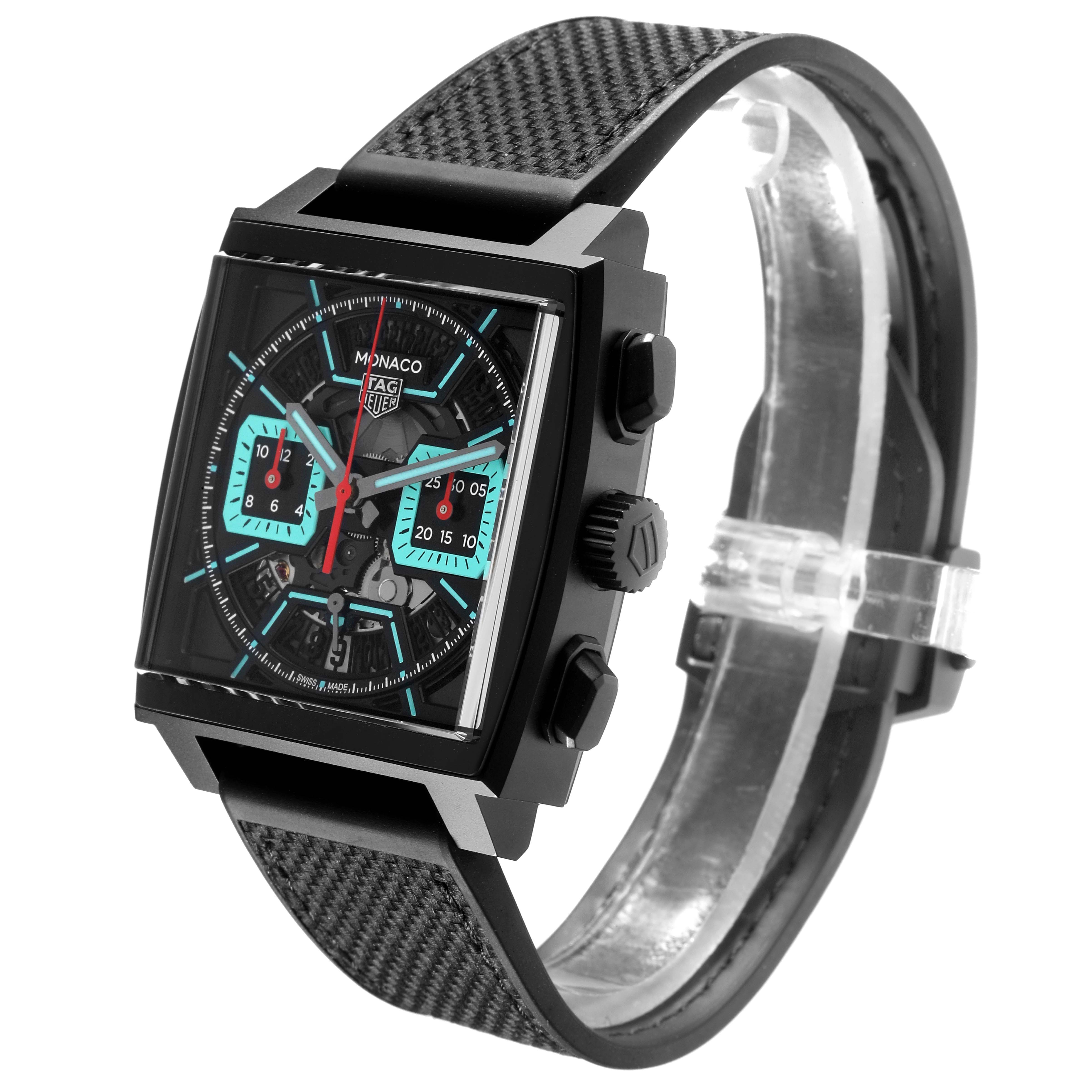 The Tag Heuer Monaco CBL2184.FT6236 Men's Titanium Transparent Dial CBL2184.FT6236 Men's Titanium Transparent Dial watch is shown at an angle displaying the face, case, side pushers, and strap.