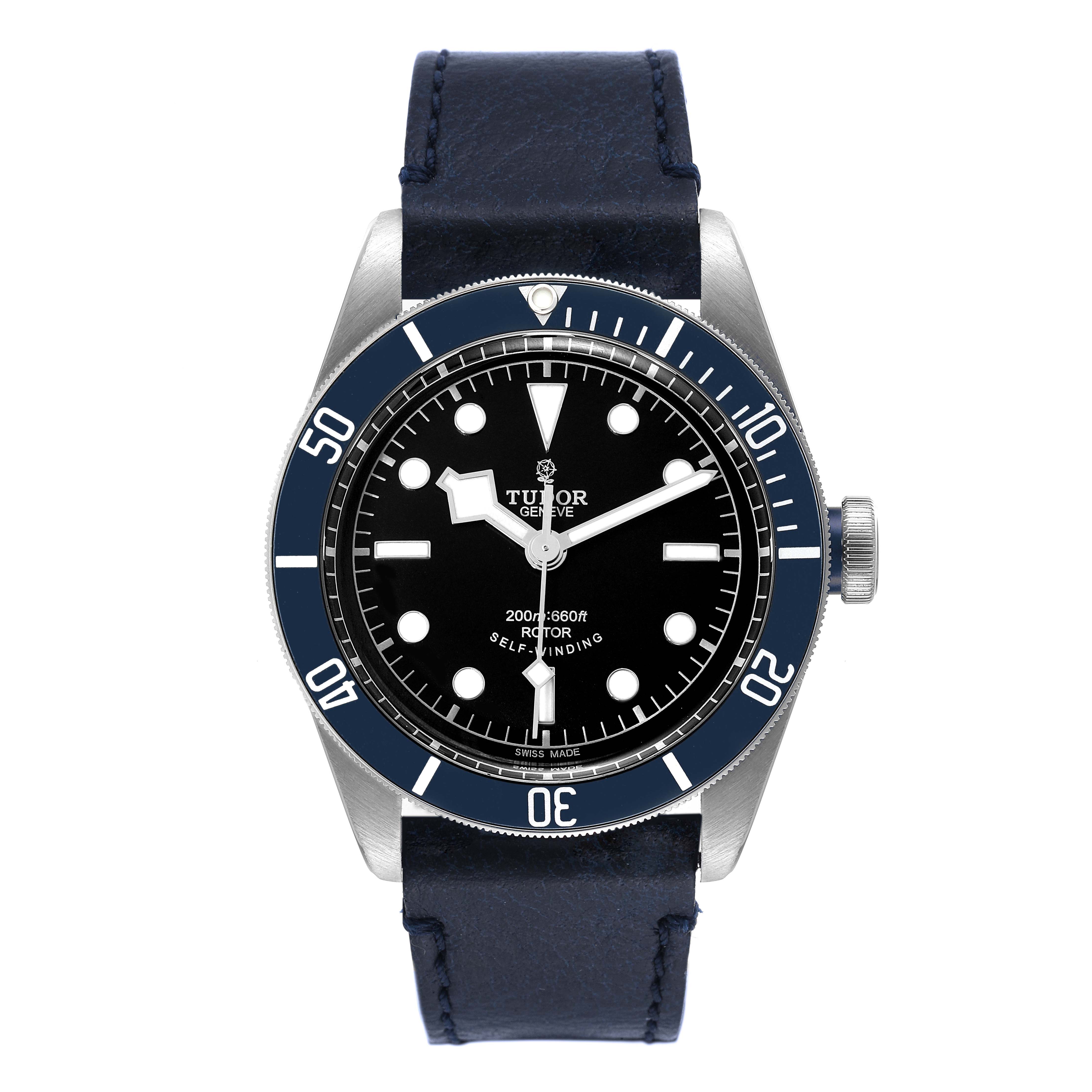 The Tudor Heritage Black Bay 79220 Men's Stainless Steel Black Dial 79220 Men's Stainless Steel Black Dial watch is shown from a front angle, displaying the dial, bezel, crown, and strap.