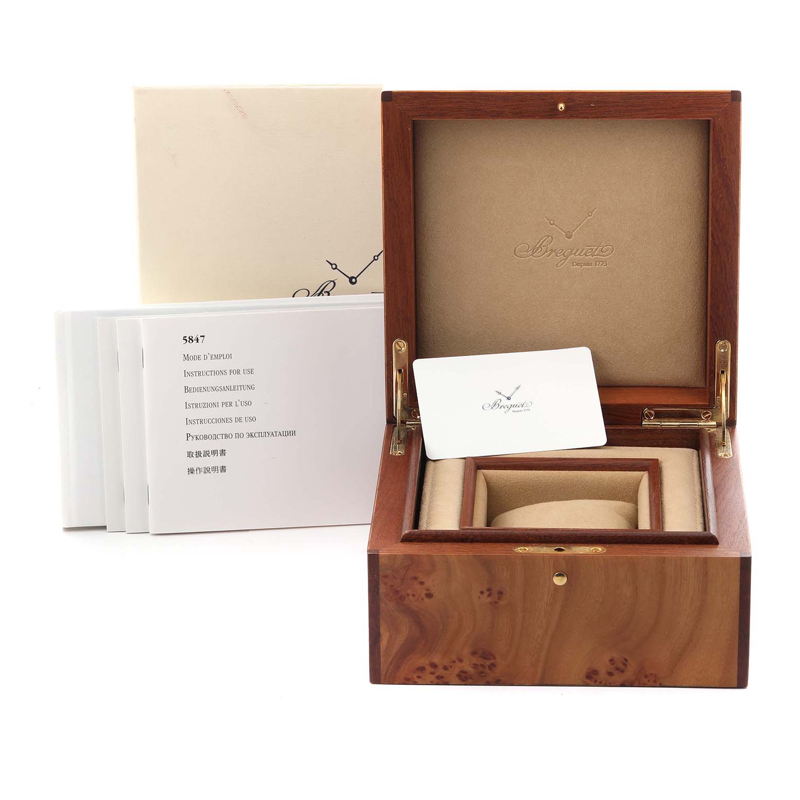 The image shows a Breguet Marine 5847BR/Z2/5ZV Men's Rose Gold Black Dial 5847BR/Z2/5ZV Men's Rose Gold Black Dial watch box with booklets and an authentication card, viewed from the top and slightly to the right.