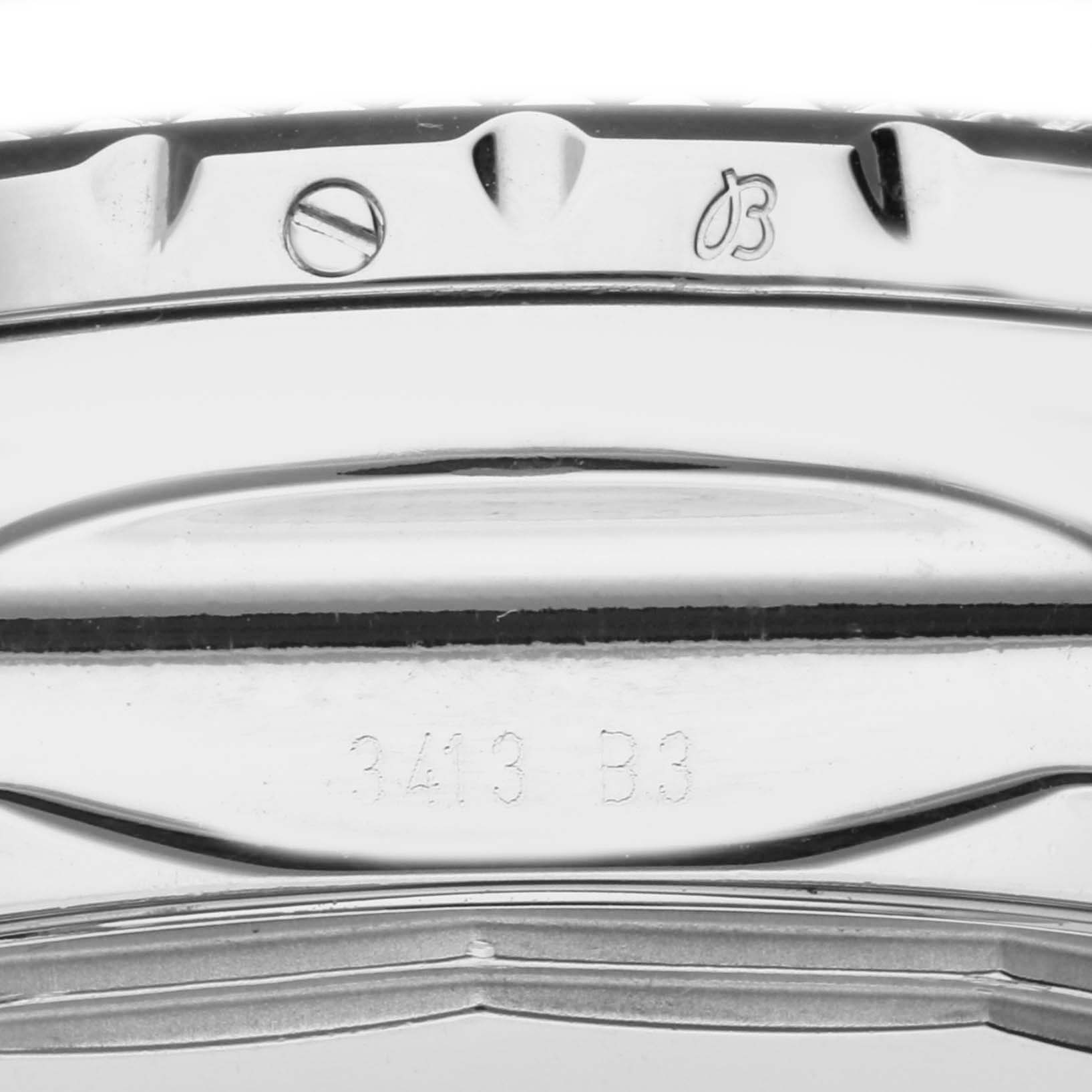 The image shows a detailed side view of the Breitling Bentley A1336212/A726 Men's Stainless Steel White Dial A1336212/A726 Men's Stainless Steel White Dial watch bezel, screws, and engraved markings.