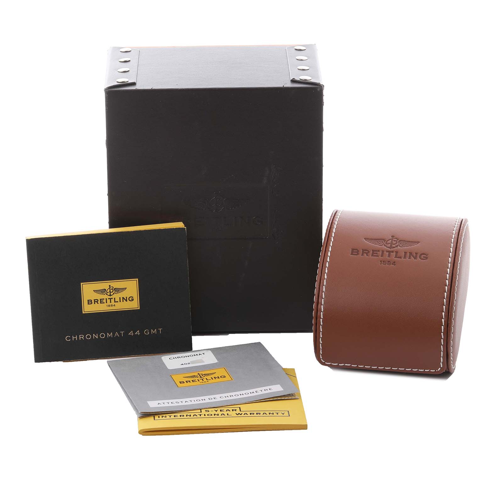 The image shows a Breitling Chronomat AB0420 Men's Stainless Steel Black Dial AB0420 Men's Stainless Steel Black Dial model box, a leather case, and accompanying manuals from a front angle.