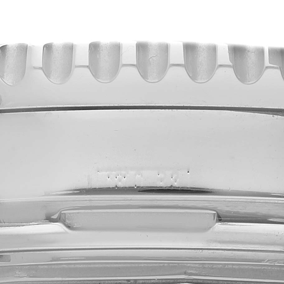 This close-up image shows the knurled bezel detail of a Breitling Navitimer A23322 Men
s Stainless Steel Black Dial A23322 Men
s Stainless Steel Black Dial watch.