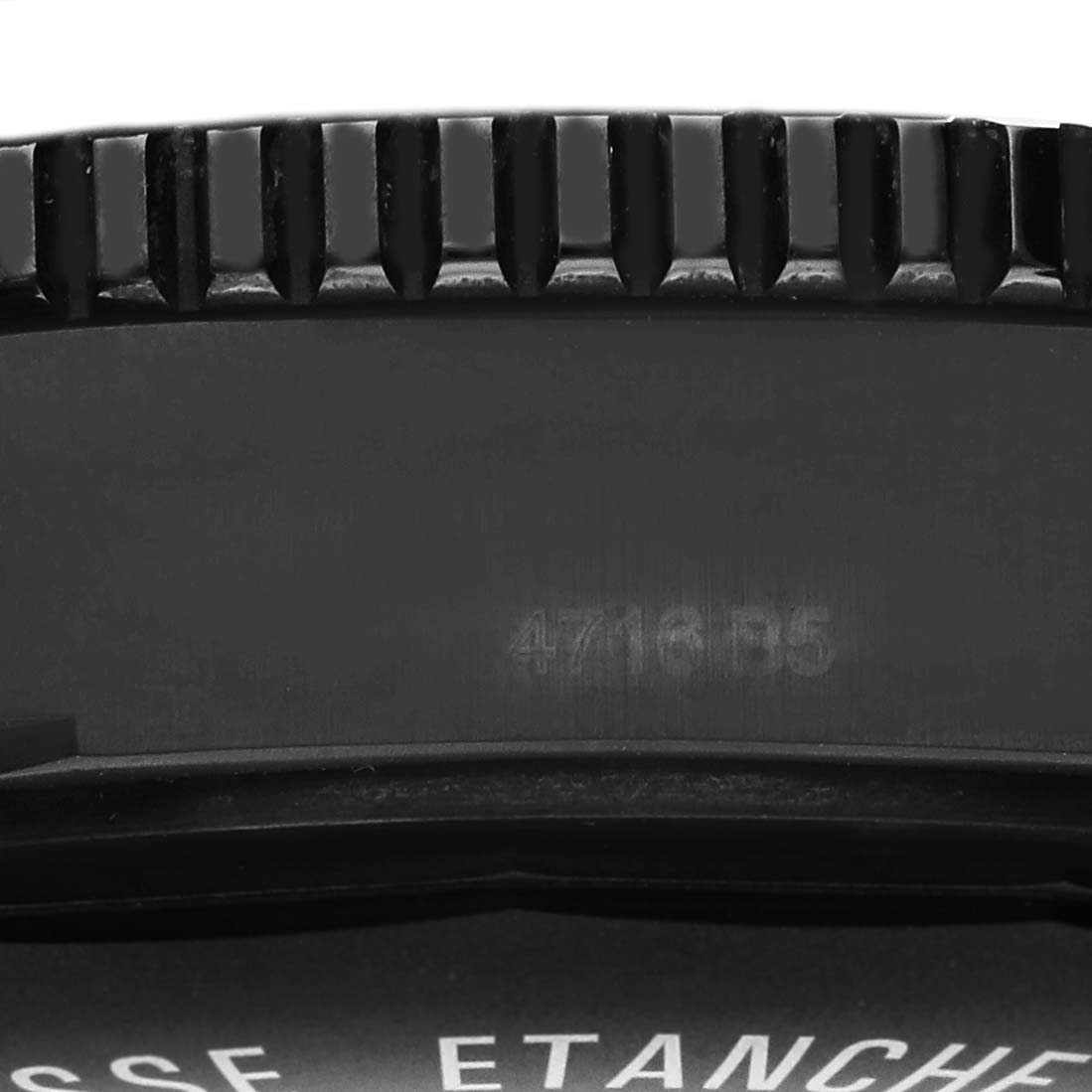 The image shows a close-up of the bezel and part of the dial of a Breitling Superocean M17393 Men's Stainless Steel Black Dial M17393 Men's Stainless Steel Black Dial watch.