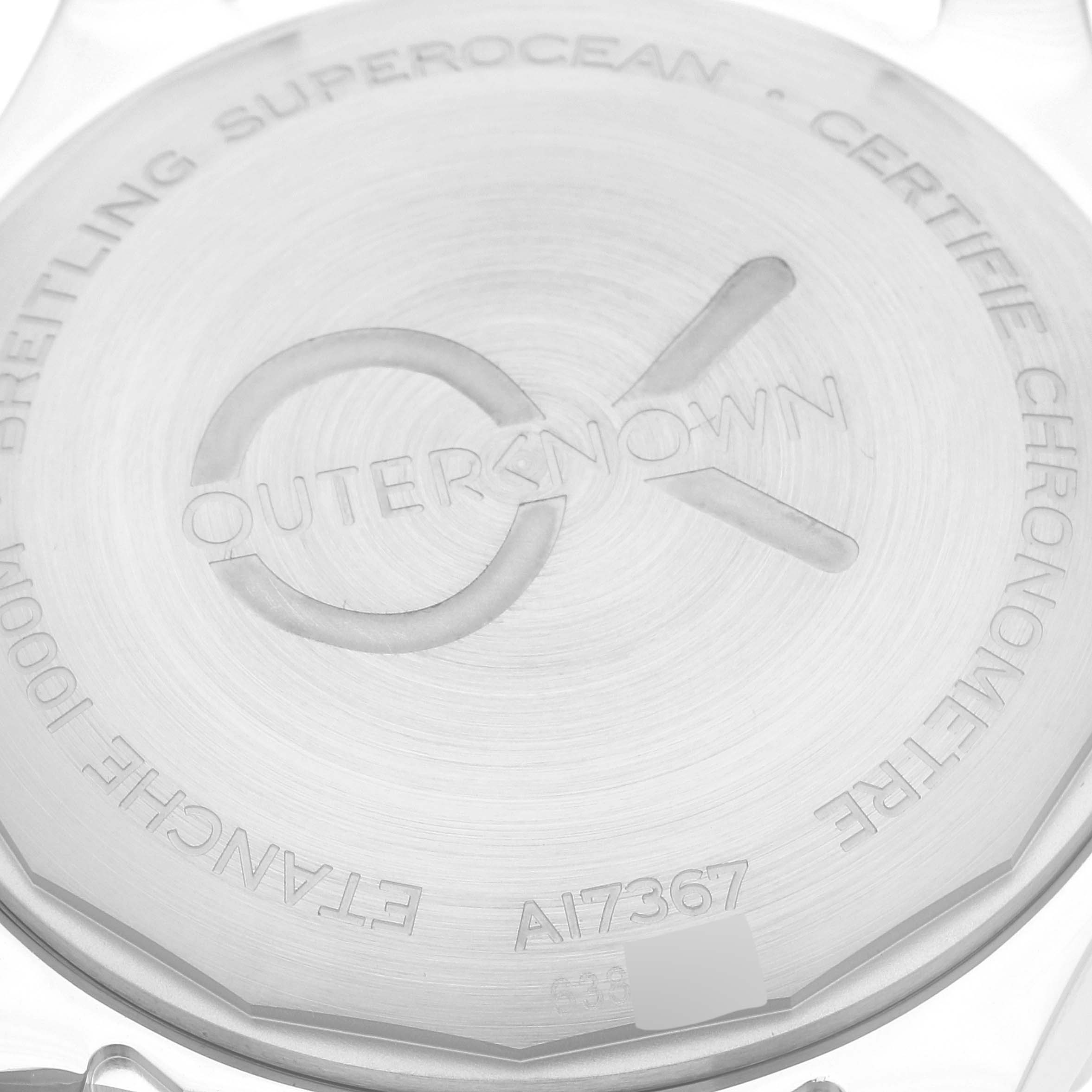 This image shows the back cover of a Breitling Superocean A17367 Men's Stainless Steel Green Dial A17367 Men's Stainless Steel Green Dial watch, highlighting model details and the "Outerknown" engraving.