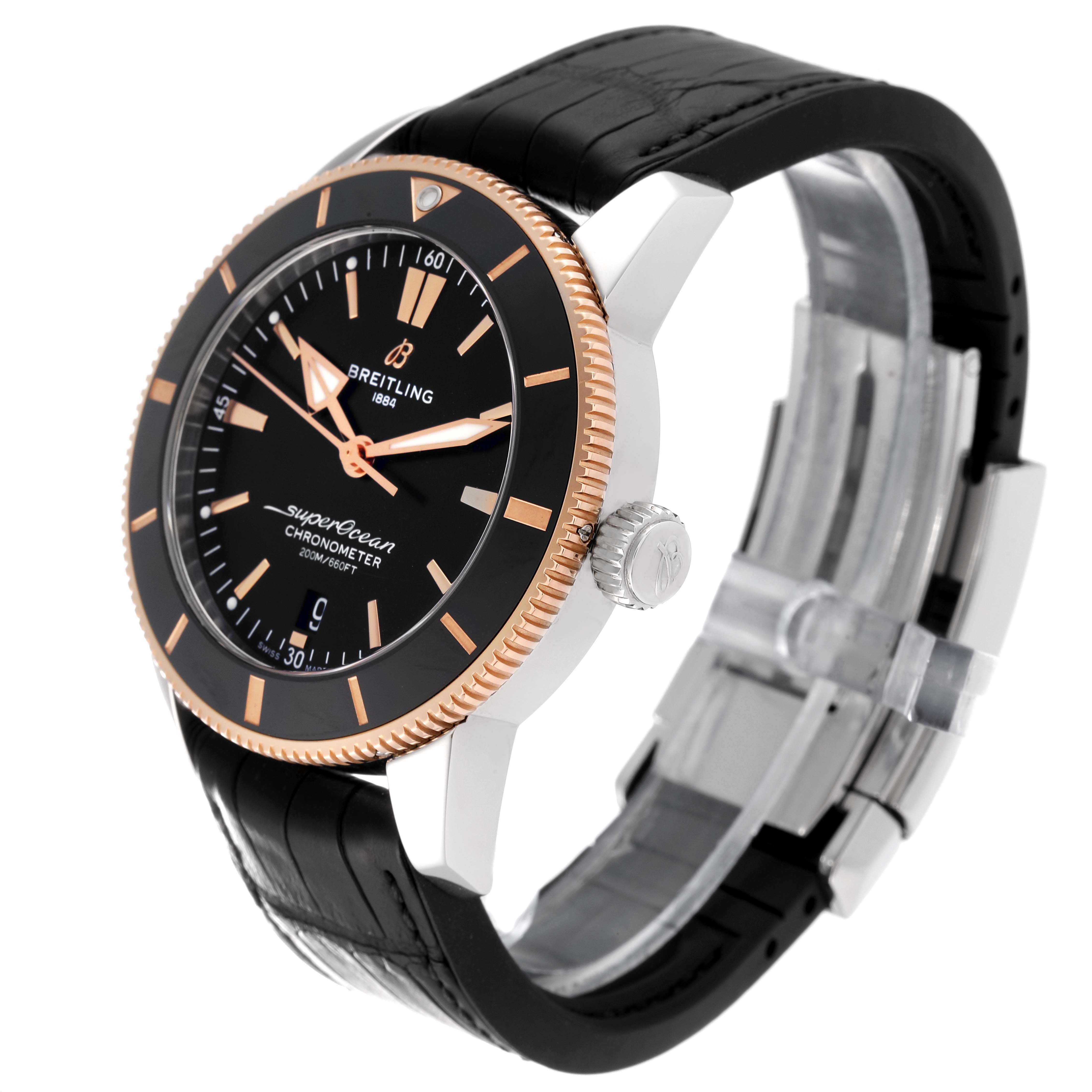 The Breitling Superocean UB2030121B1S1 Men's Steel and Gold (two tone) Black Dial UB2030121B1S1 Men's Steel and Gold (two tone) Black Dial watch is displayed at a three-quarter angle, showing the face, bezel, crown, and black strap.