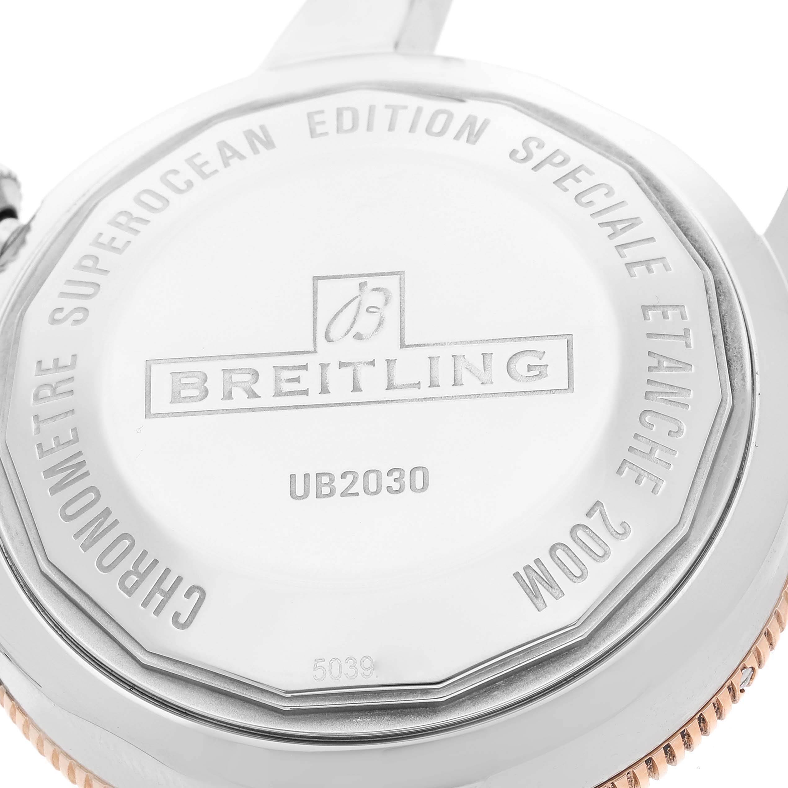 The image shows the back case of a Breitling Superocean UB2030121B1S1 Men's Steel and Gold (two tone) Black Dial UB2030121B1S1 Men's Steel and Gold (two tone) Black Dial watch, revealing the model number UB2030.