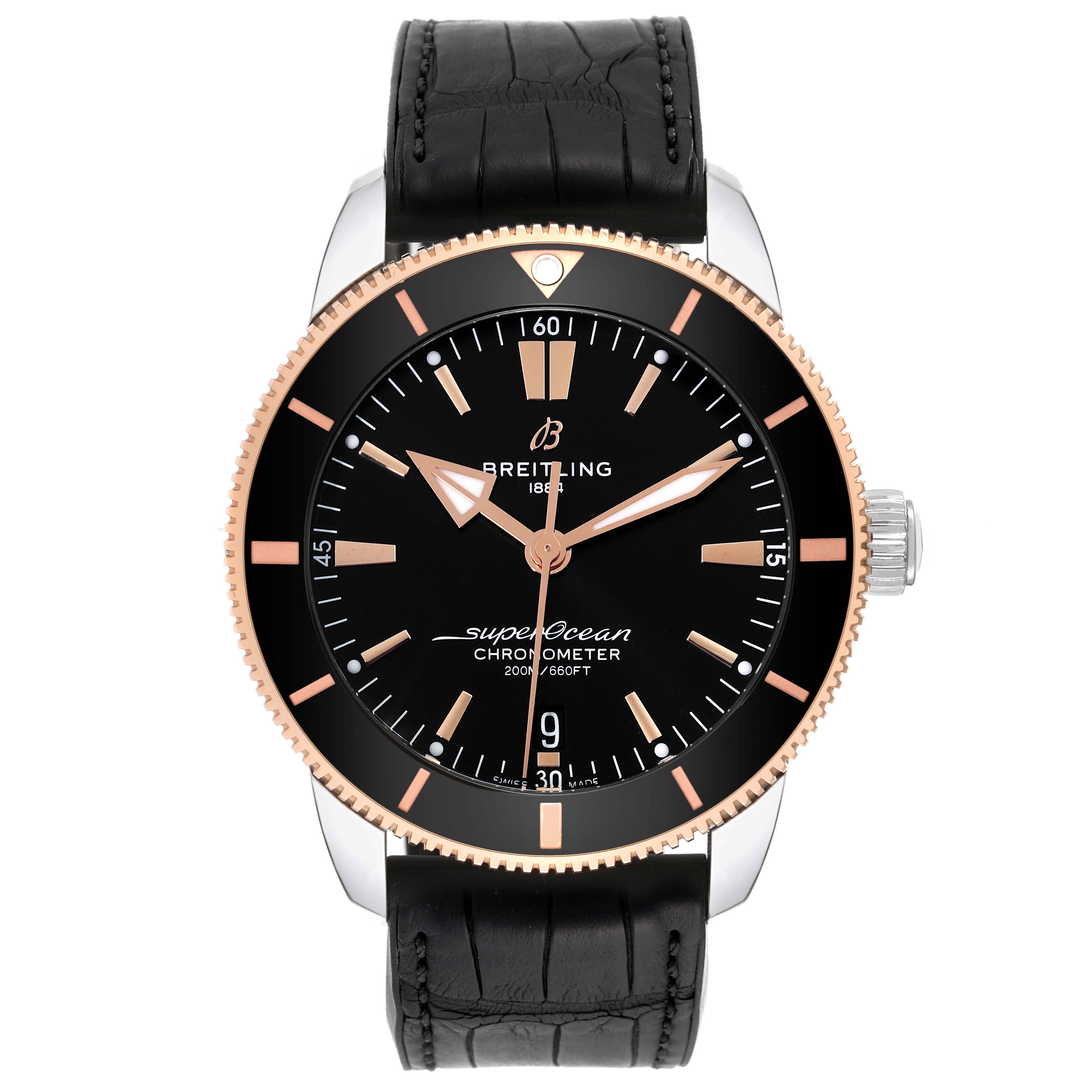The image shows a front view of the Breitling Superocean UB2030121B1S1 Men's Steel and Gold (two tone) Black Dial UB2030121B1S1 Men's Steel and Gold (two tone) Black Dial watch, highlighting its black dial, rose gold markers, and black leather strap.