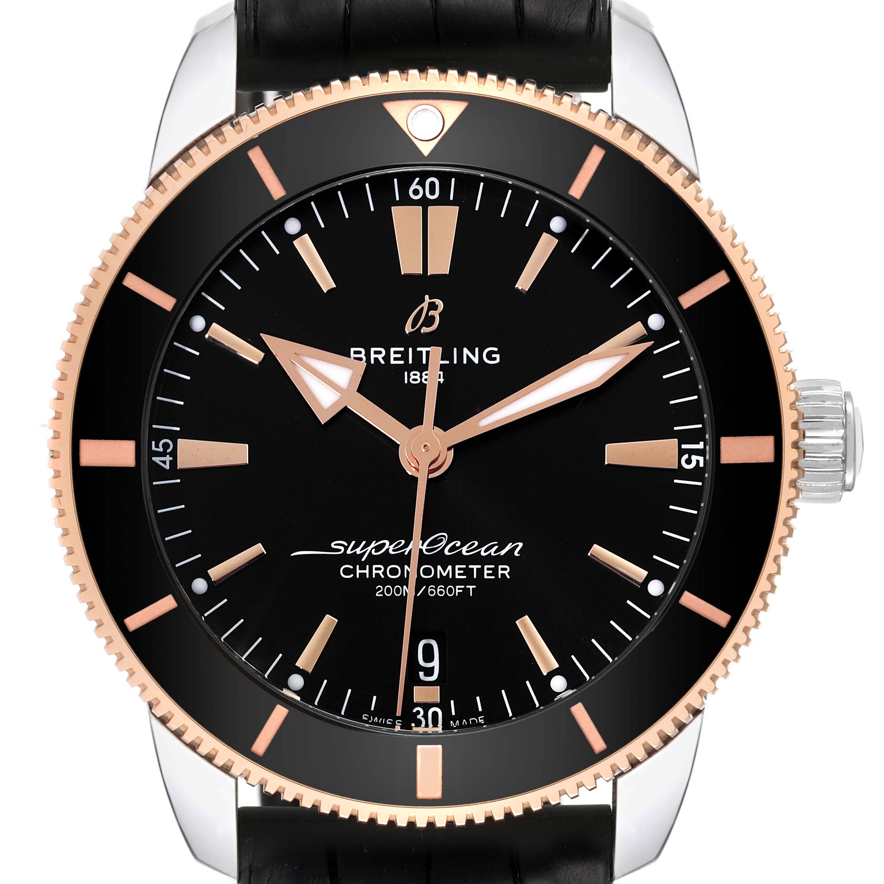 The Breitling Superocean UB2030121B1S1 Men's Steel and Gold (two tone) Black Dial UB2030121B1S1 Men's Steel and Gold (two tone) Black Dial watch is shown from the front, highlighting the dial, bezel, hands, and crown.