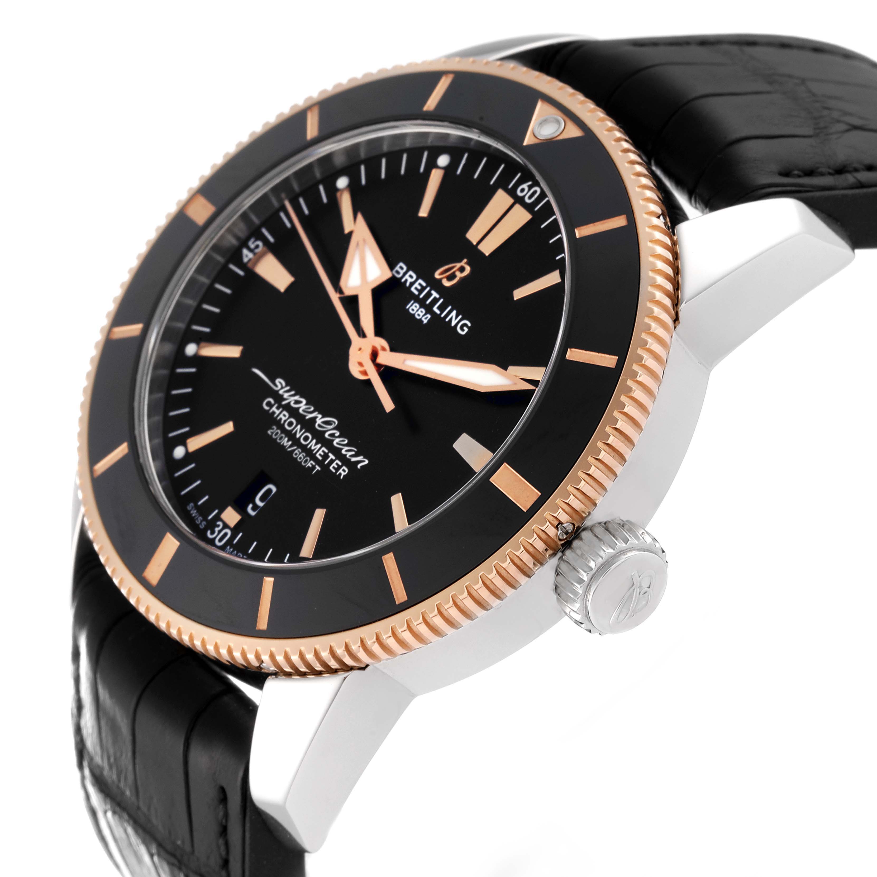 The image shows a side angle of the Breitling Superocean UB2030121B1S1 Men's Steel and Gold (two tone) Black Dial UB2030121B1S1 Men's Steel and Gold (two tone) Black Dial watch, highlighting the bezel, crown, and part of the strap.