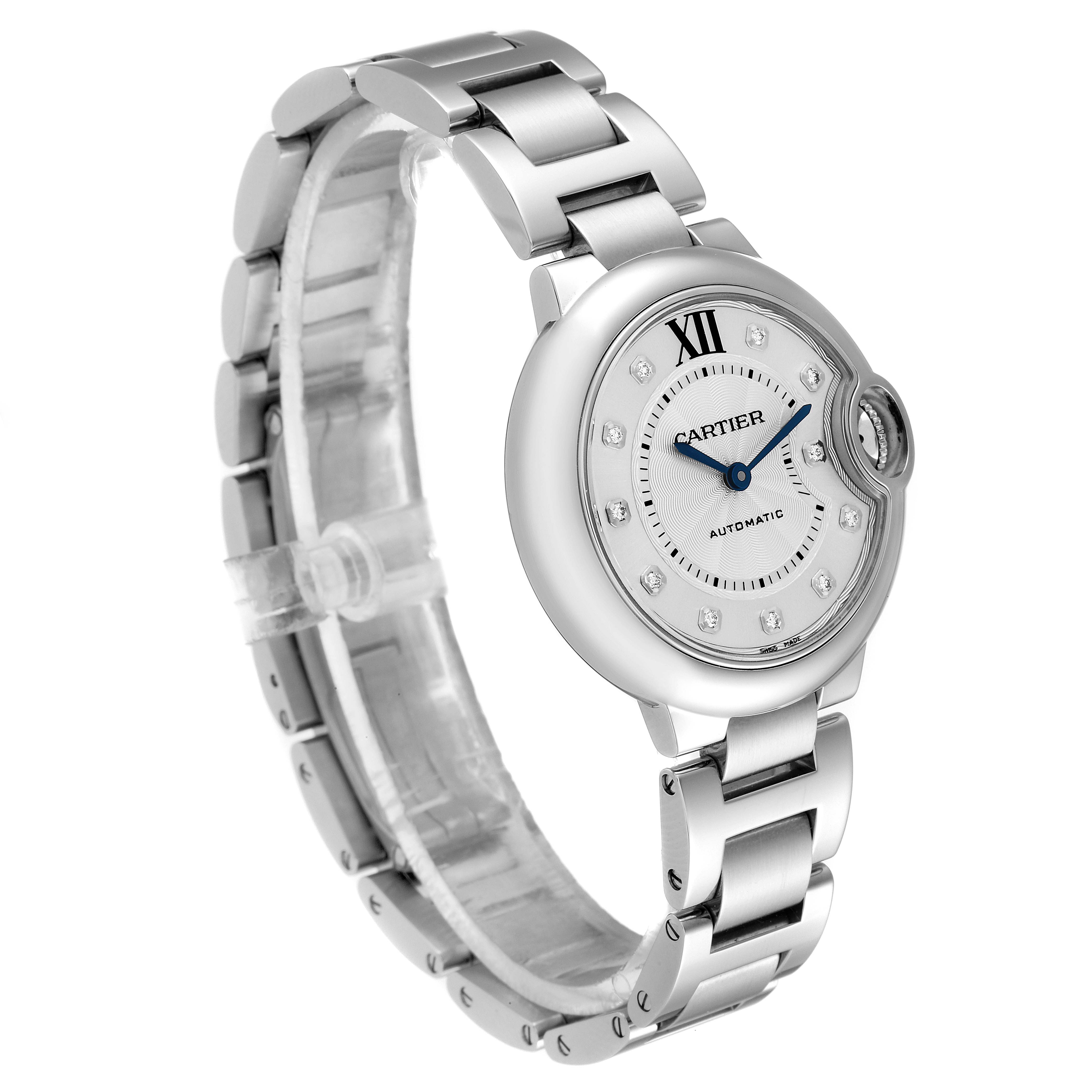 The Cartier Ballon Bleu WE902074 Women's Stainless Steel Silver Dial WE902074 Women's Stainless Steel Silver Dial watch is shown at an angled side view, displaying its silver band, round dial, and signature crown guard.