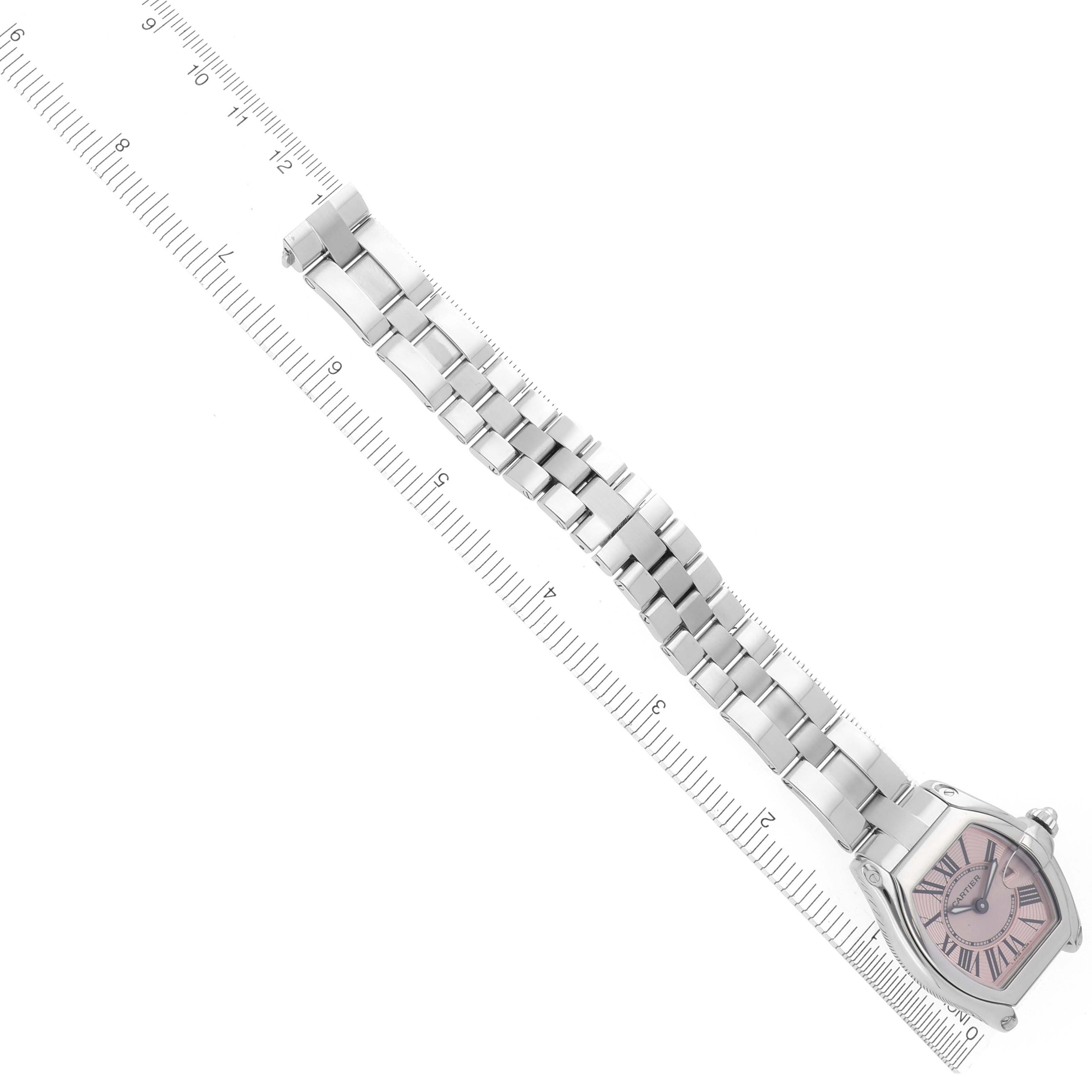 The Cartier Roadster W62017V3 Women's Stainless Steel Pink Dial W62017V3 Women's Stainless Steel Pink Dial watch is shown at an angled view, featuring the dial and full metal bracelet.