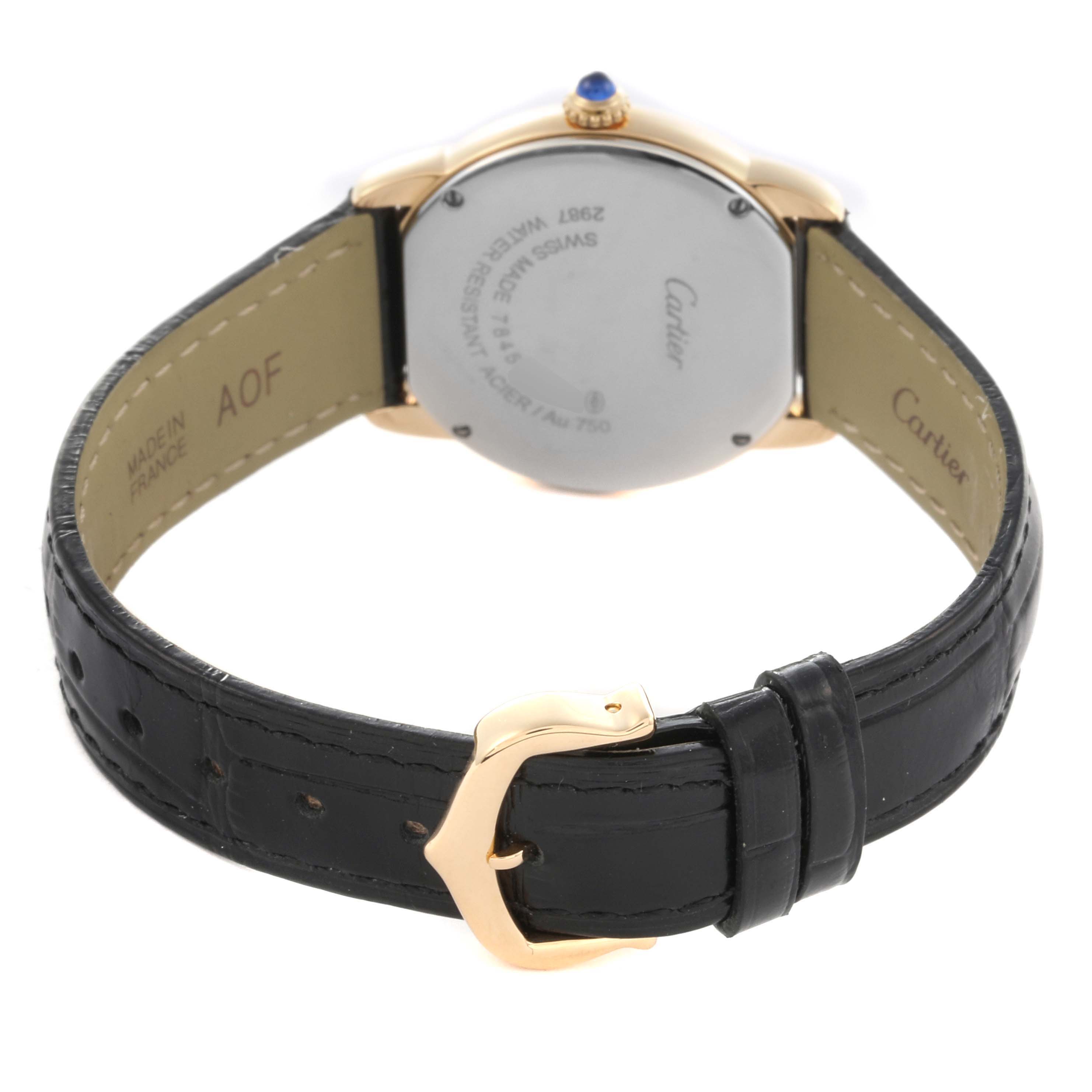 The Cartier Ronde W6700355 Women's Steel and Gold (two tone) Silver Dial W6700355 Women's Steel and Gold (two tone) Silver Dial watch is shown from a rear angle, displaying the case back and leather strap with buckle.