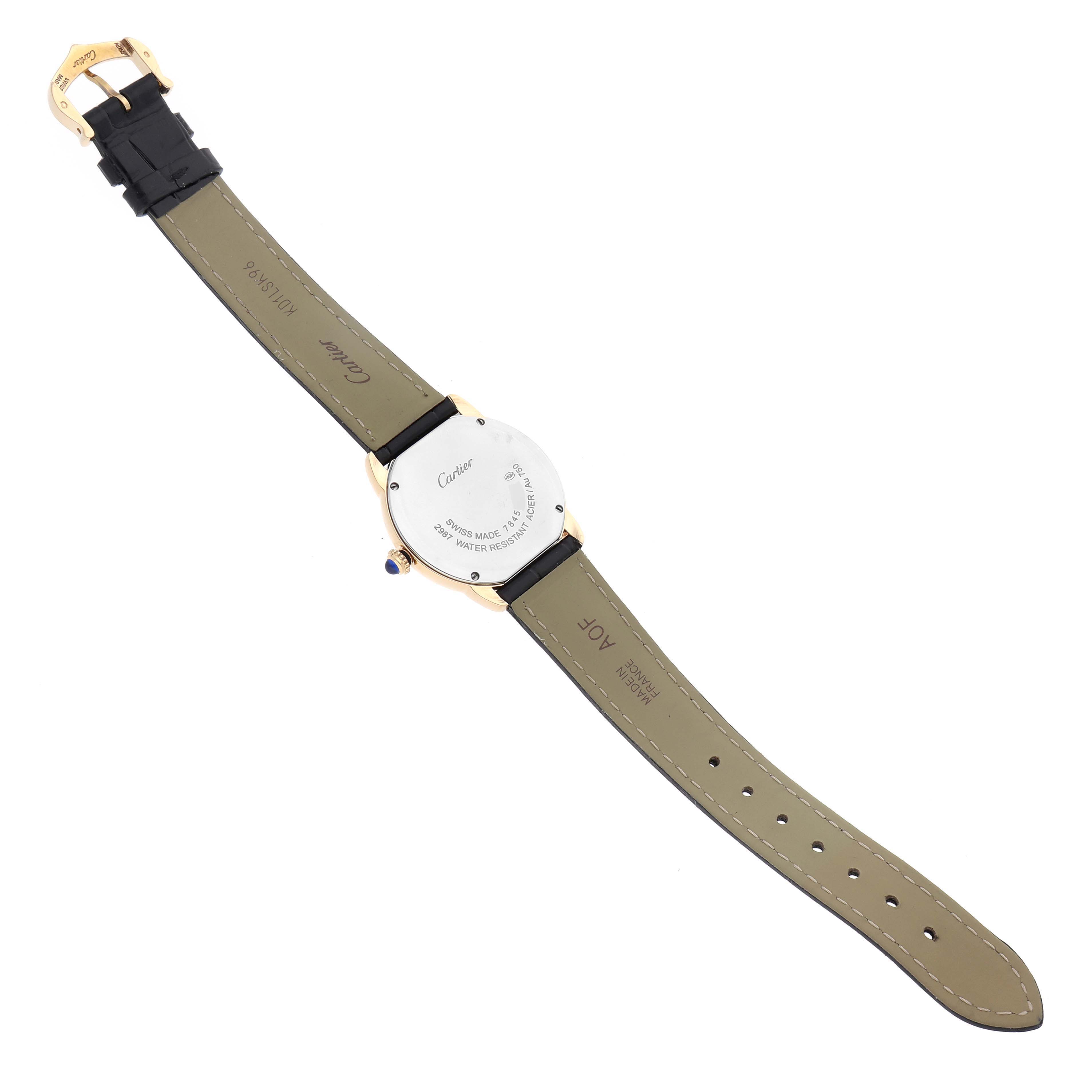 The Cartier Ronde W6700355 Women's Steel and Gold (two tone) Silver Dial W6700355 Women's Steel and Gold (two tone) Silver Dial watch is shown from the back, displaying the case back, strap, and buckle.