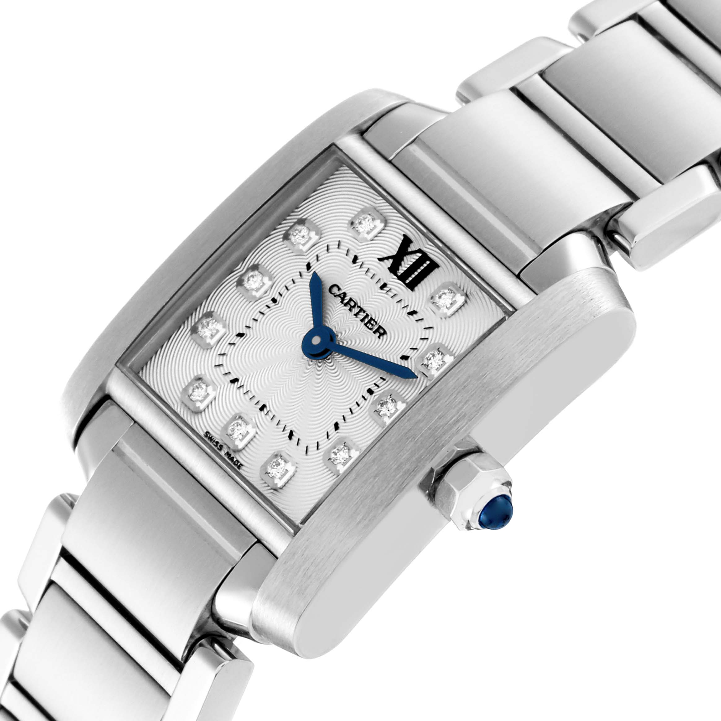 The image shows a close-up of the Cartier Tank Francaise WE110006 Women's Stainless Steel Silver Dial WE110006 Women's Stainless Steel Silver Dial watch from a diagonal angle, highlighting the face, blue hands, and metallic band.