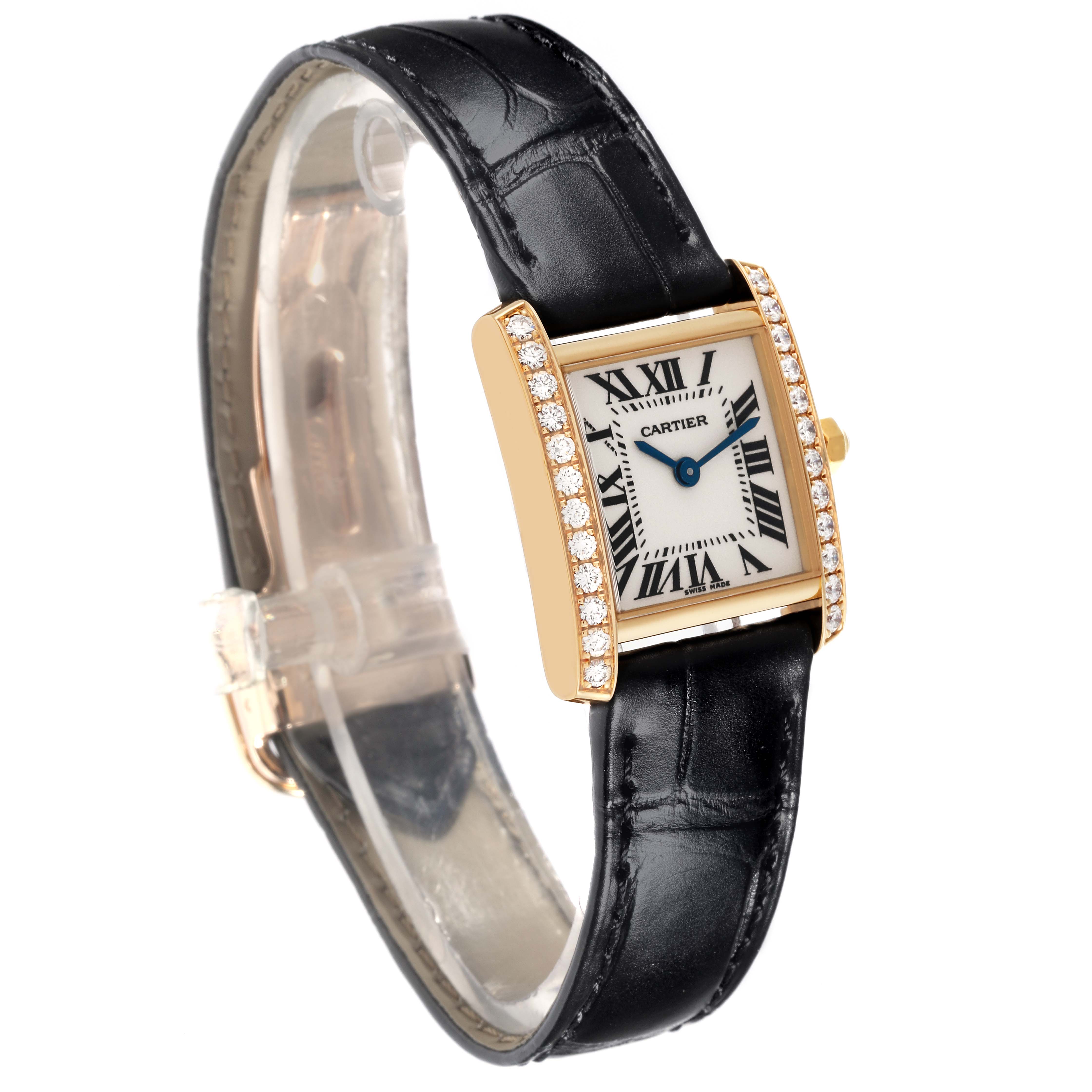 The Cartier Tank Française watch is shown at an angle highlighting its face, strap, and diamond-encrusted bezel.