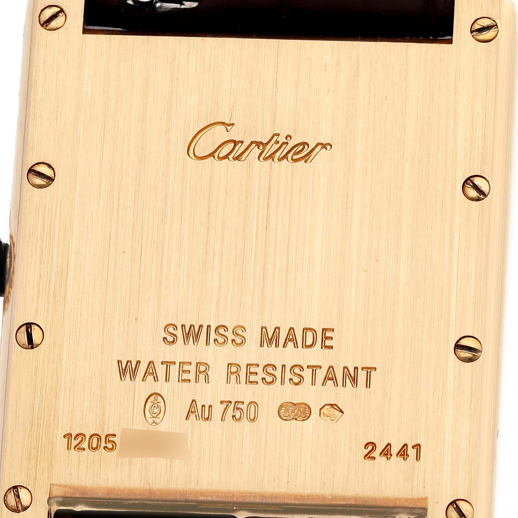 The image shows the back case of a Cartier Tank Louis W1529756 Men's Yellow Gold Silver Dial W1529756 Men's Yellow Gold Silver Dial watch, highlighting engravings and screws.