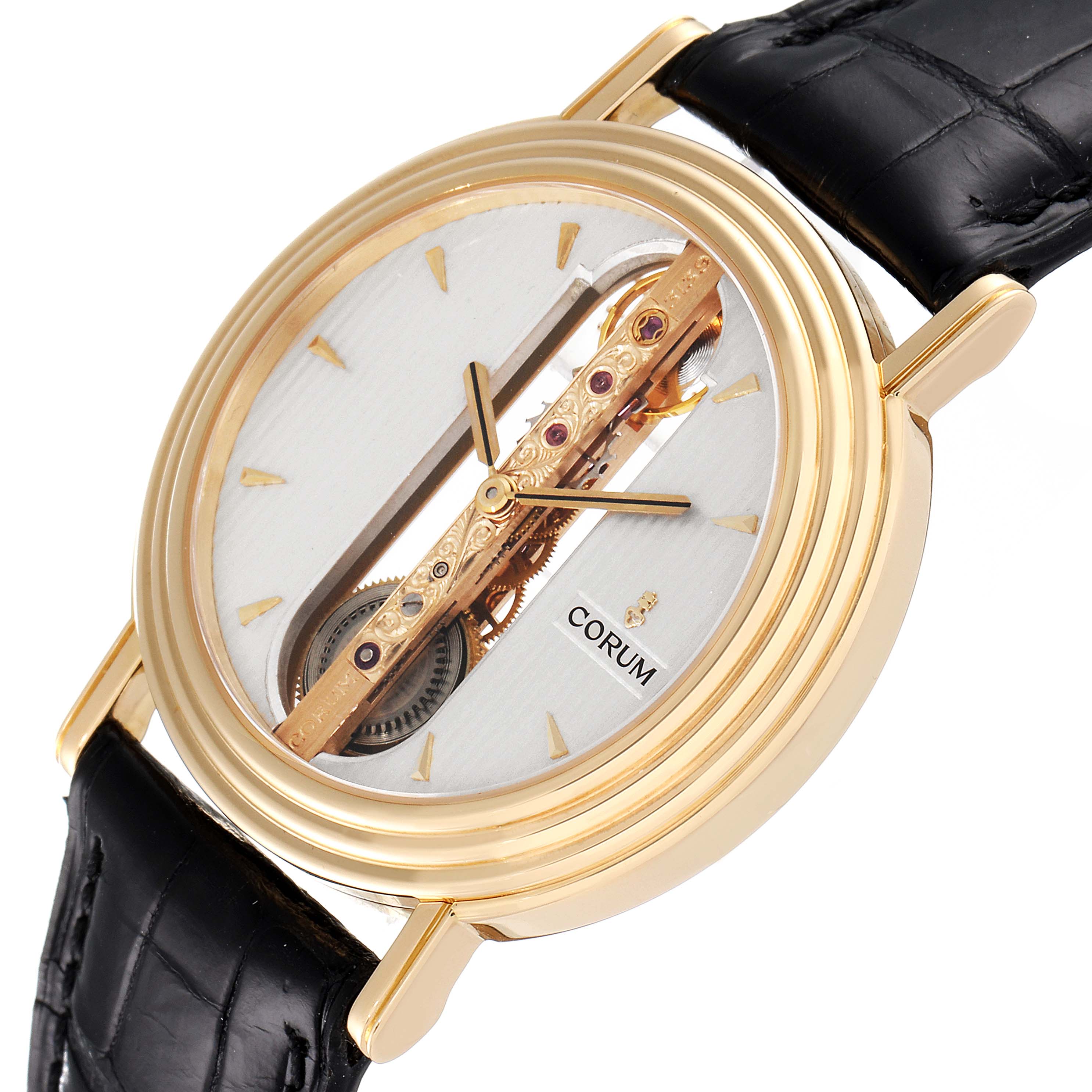 The Corum Golden Bridge 13.240.58 Men's Yellow Gold Silver Dial 13.240.58 Men's Yellow Gold Silver Dial watch is shown at a front angle, detailing its intricate inner mechanics and black leather strap.