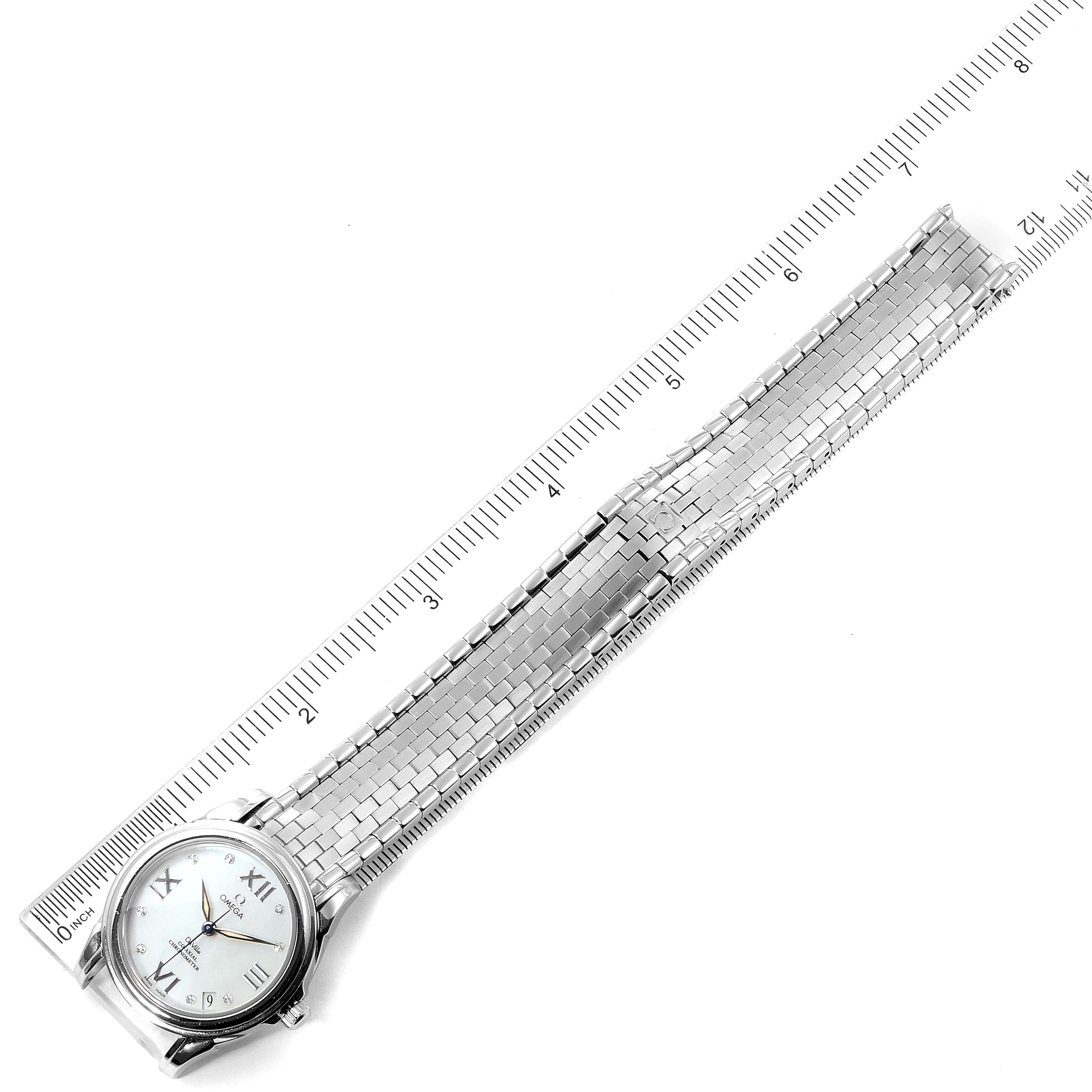 The Omega 4531.31.00  Women
s Stainless Steel Mother of Pearl Dial 4531.31.00  Women
s Stainless Steel Mother of Pearl Dial DeVille Co-Axial 31 MOP Diamond Dial Steel Ladies Watch 4531.31.00 is shown from an overhead view with a ruler for scale.
