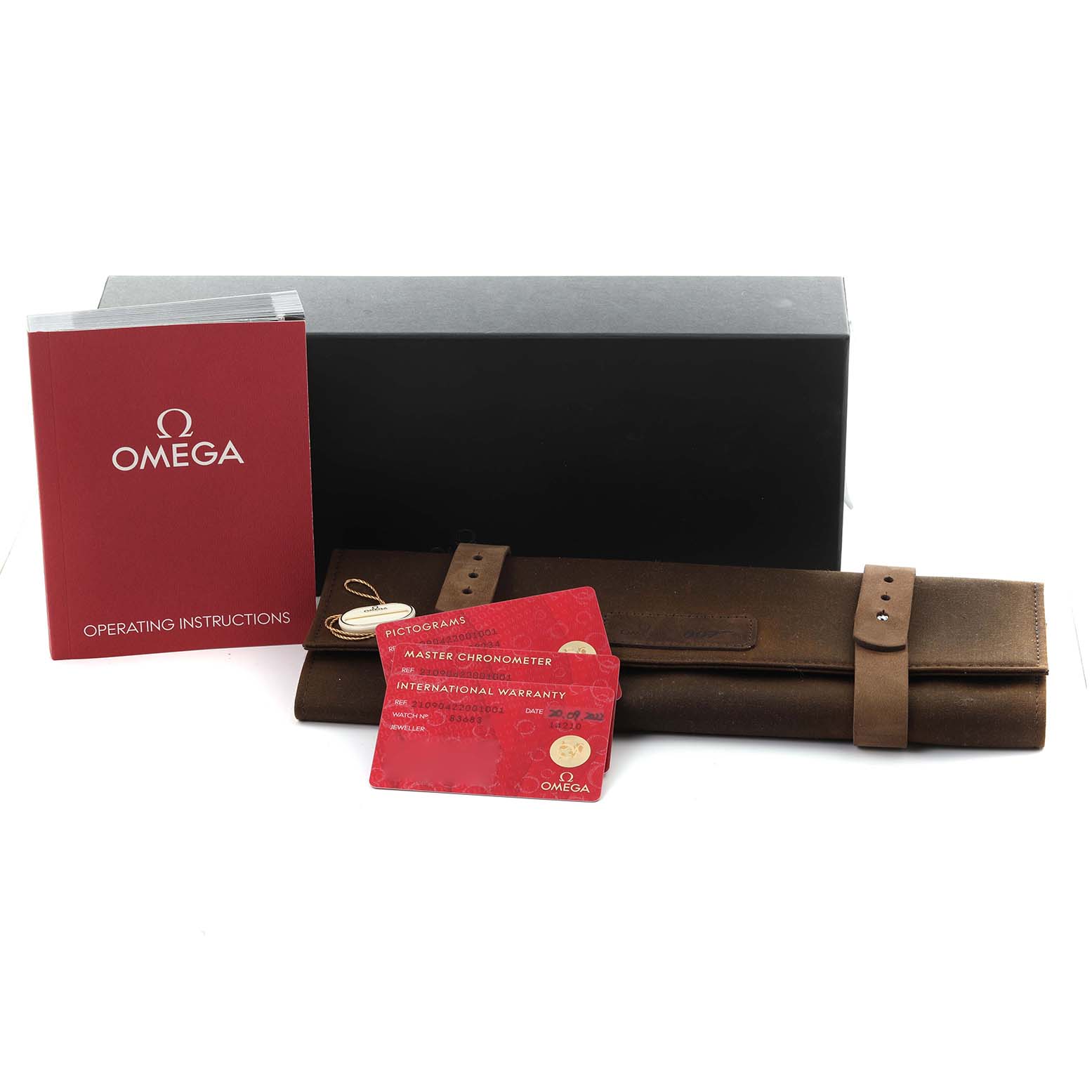 The image shows accessories for the Omega Seamaster 210.90.42.20.01.001 Men's Titanium Brown Dial 210.90.42.20.01.001 Men's Titanium Brown Dial: a box, a leather case, an instruction manual, and warranty cards.