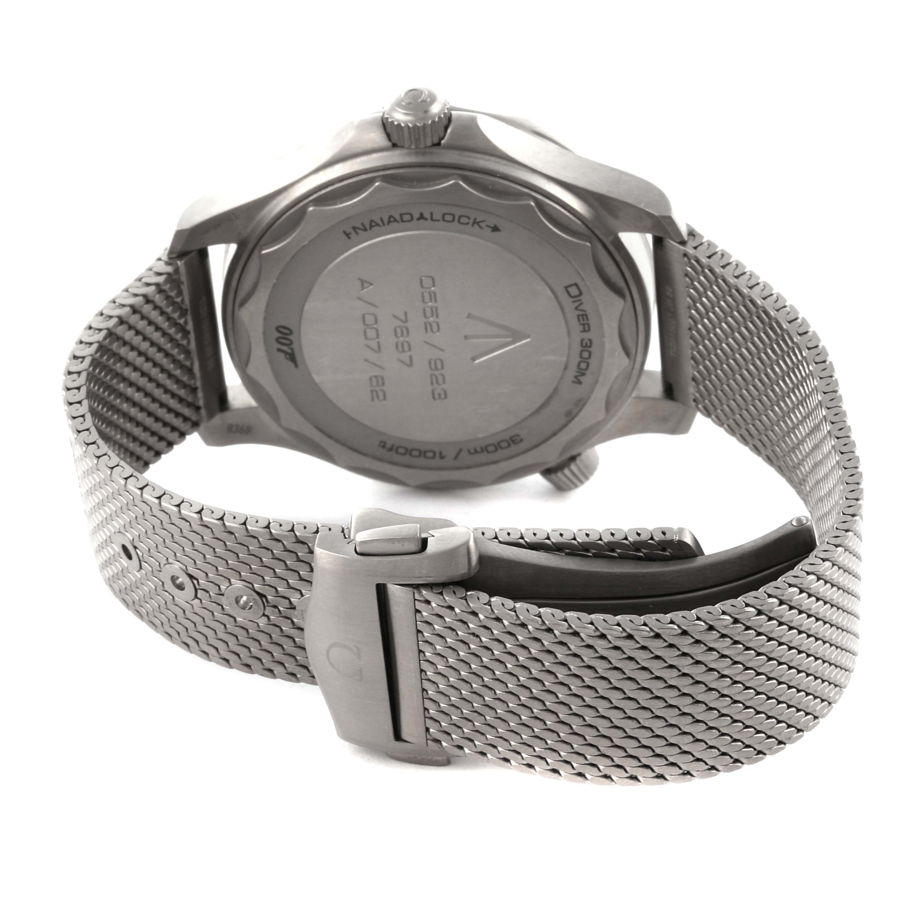 The image shows the back of an Omega Seamaster 210.90.42.20.01.001 Men's Titanium Brown Dial 210.90.42.20.01.001 Men's Titanium Brown Dial watch, featuring the case back and metal mesh bracelet.