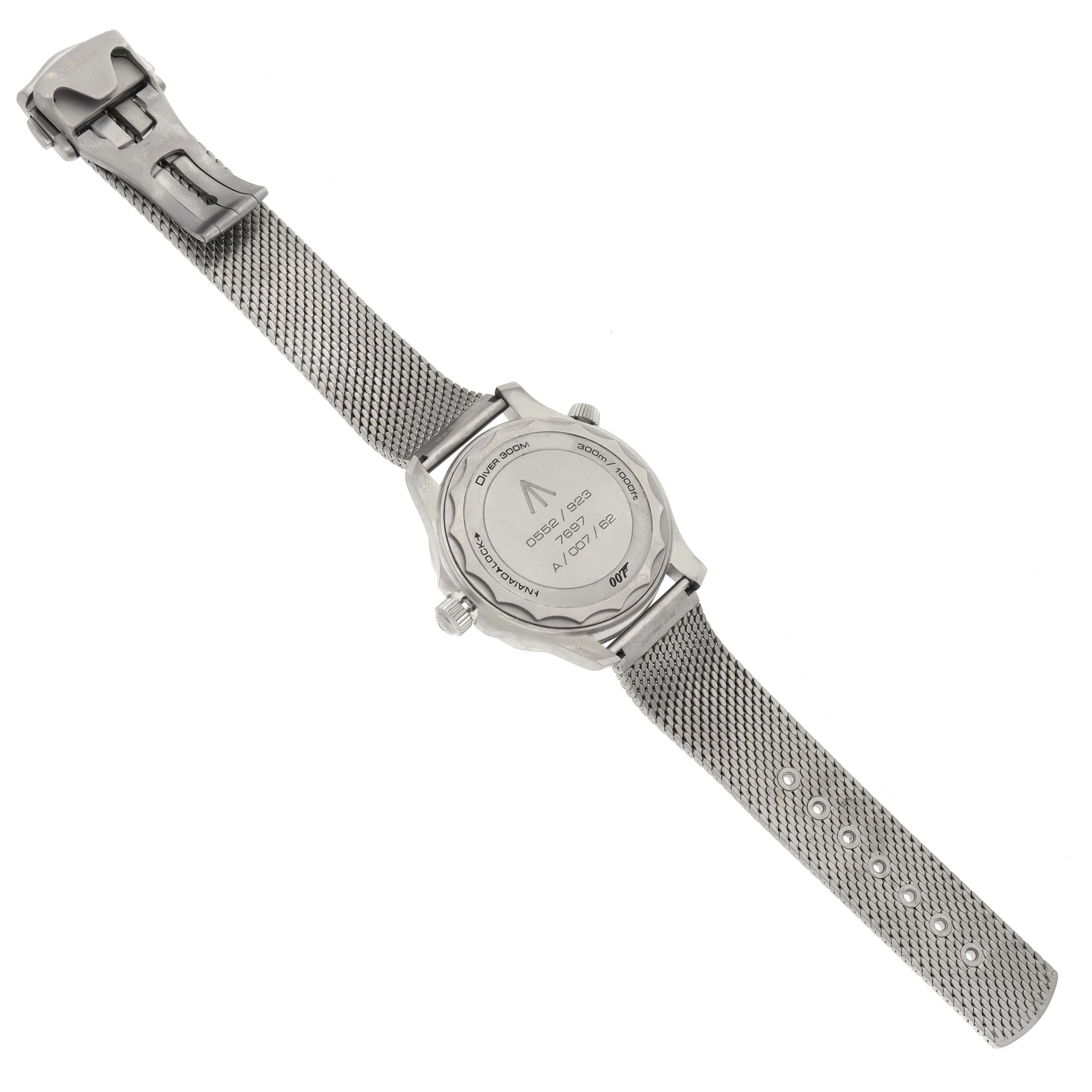 The image shows the back side of an Omega Seamaster 210.90.42.20.01.001 Men's Titanium Brown Dial 210.90.42.20.01.001 Men's Titanium Brown Dial watch, highlighting the case back and steel mesh bracelet.