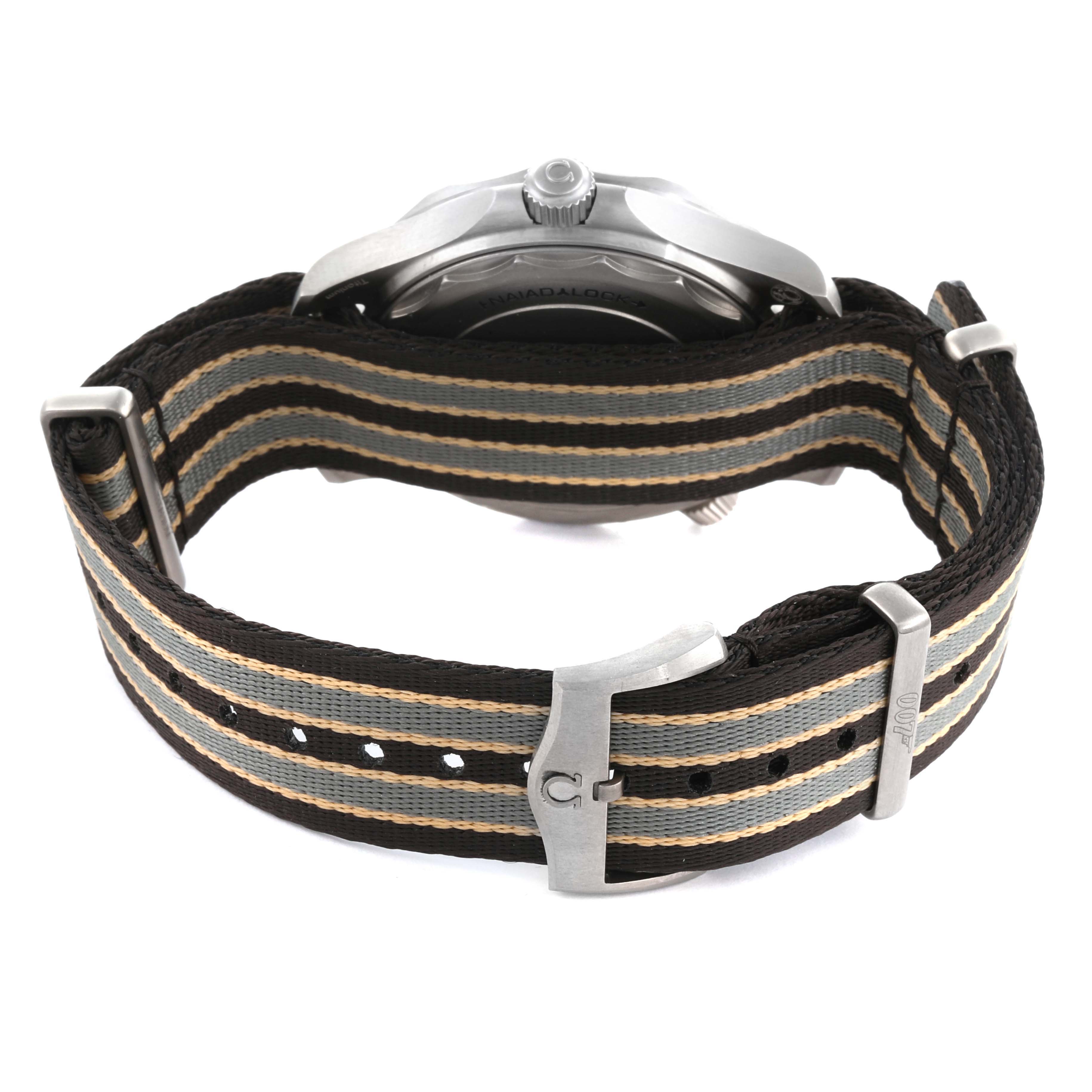 The image shows the Omega Seamaster 210.92.42.20.01.001 Men's Titanium Brown Dial 210.92.42.20.01.001 Men's Titanium Brown Dial watch from the back, highlighting its NATO strap and side profile of the case.