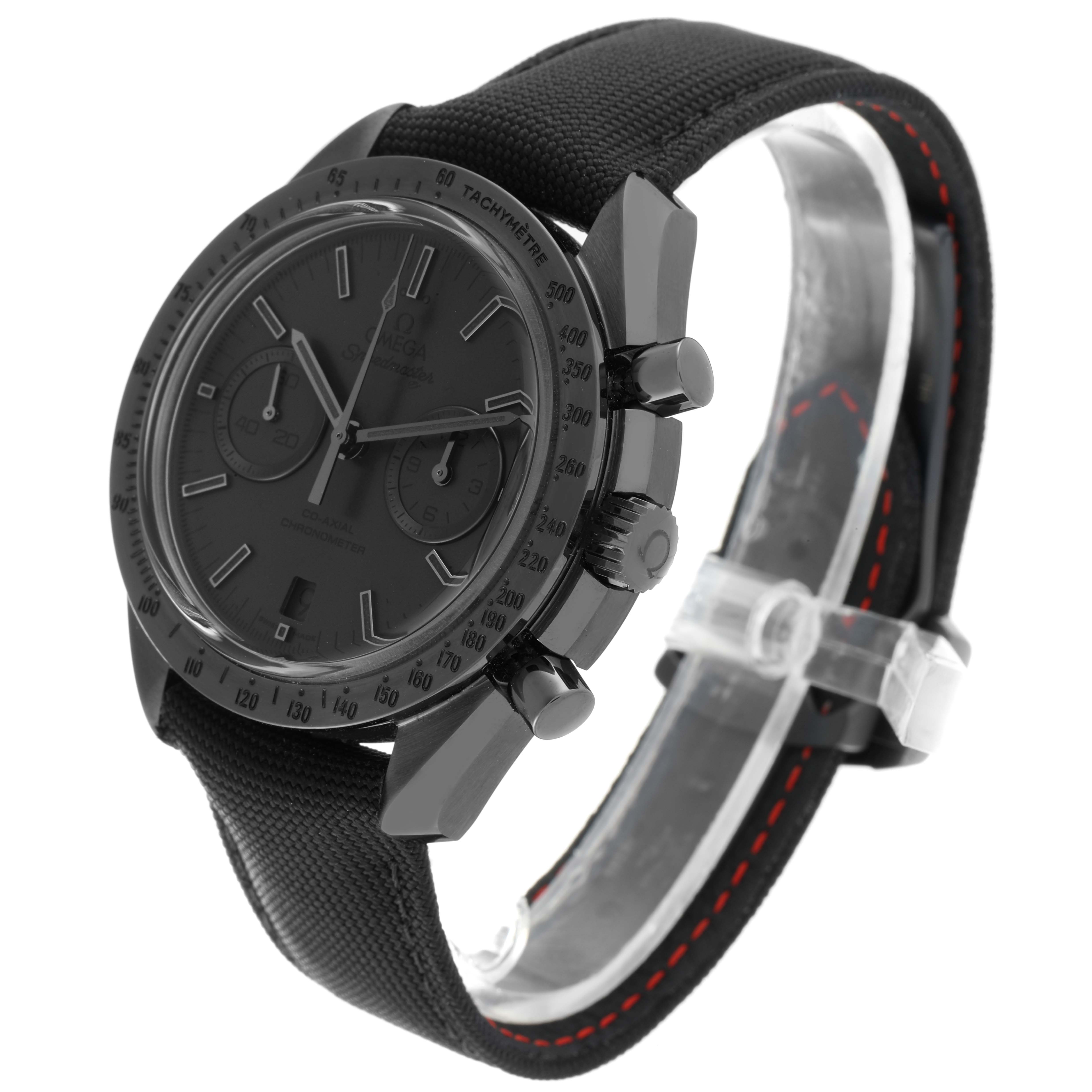 The Omega Speedmaster 311.92.44.51.01.005 Men's Ceramic Black Dial 311.92.44.51.01.005 Men's Ceramic Black Dial watch is shown at a three-quarter angle, highlighting its dark face, chronograph dials, and fabric strap.