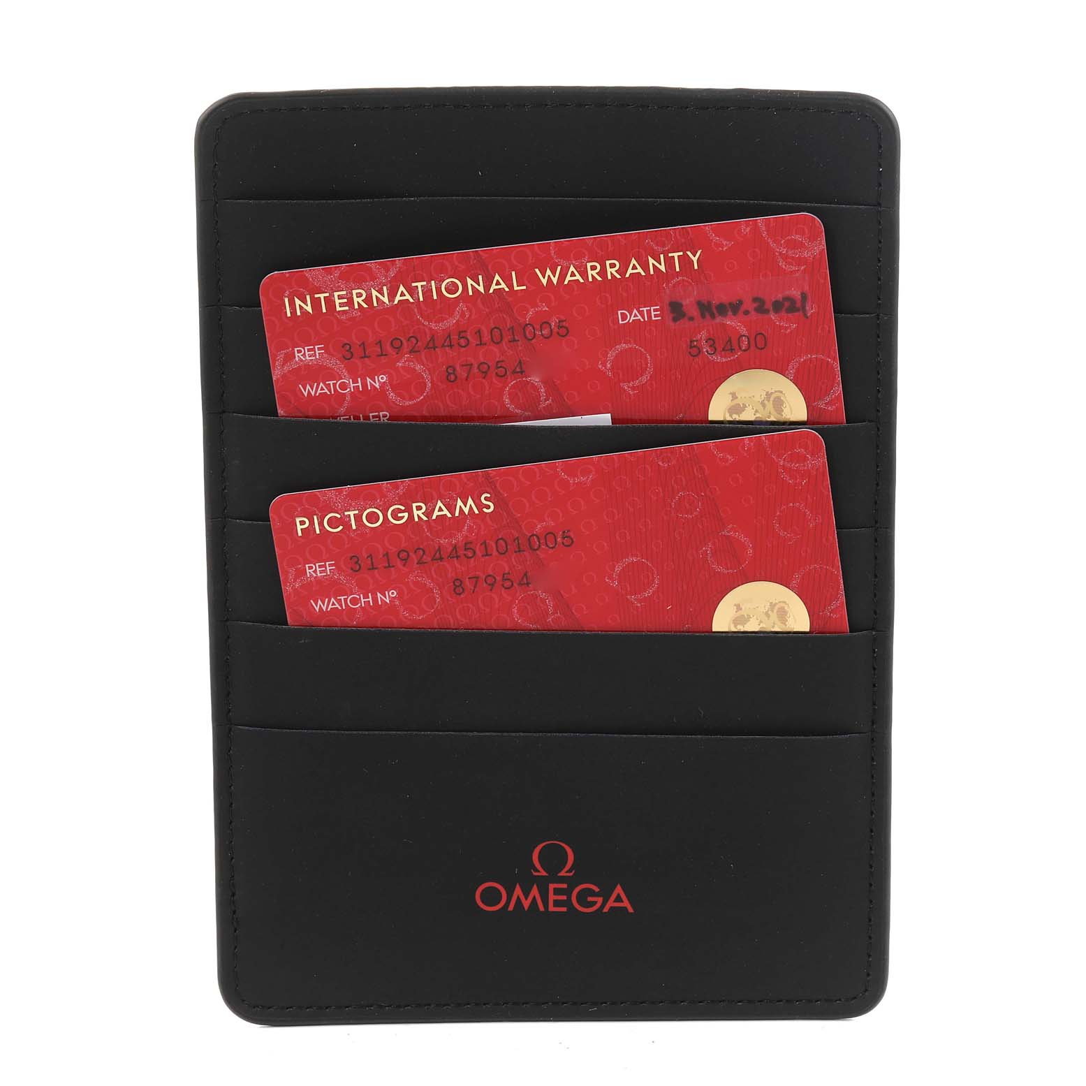 The image shows the warranty cards and case for an Omega Speedmaster 311.92.44.51.01.005 Men's Ceramic Black Dial 311.92.44.51.01.005 Men's Ceramic Black Dial watch.