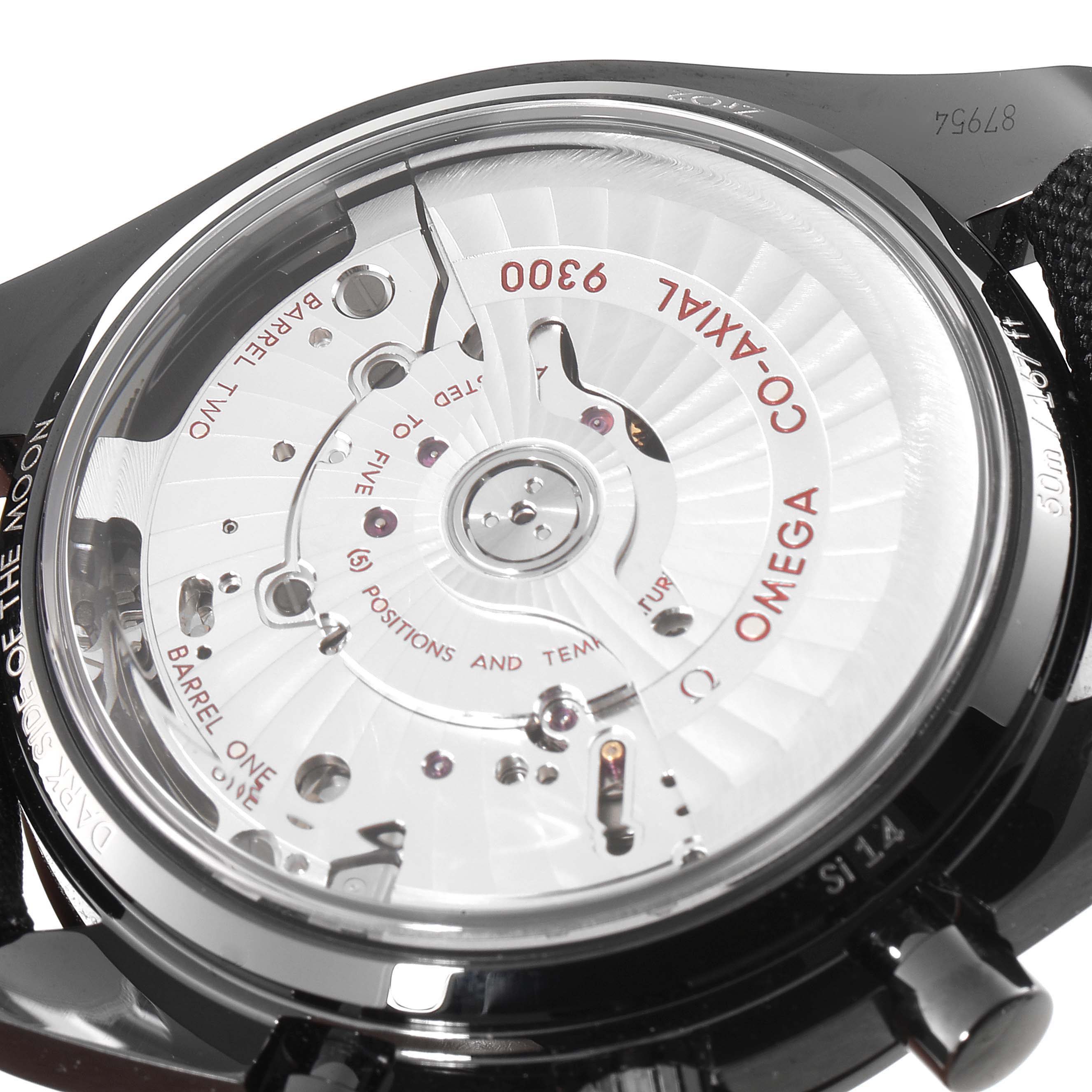 This image shows the back of an Omega Speedmaster 311.92.44.51.01.005 Men's Ceramic Black Dial 311.92.44.51.01.005 Men's Ceramic Black Dial watch, highlighting its mechanical movement and engraving details.