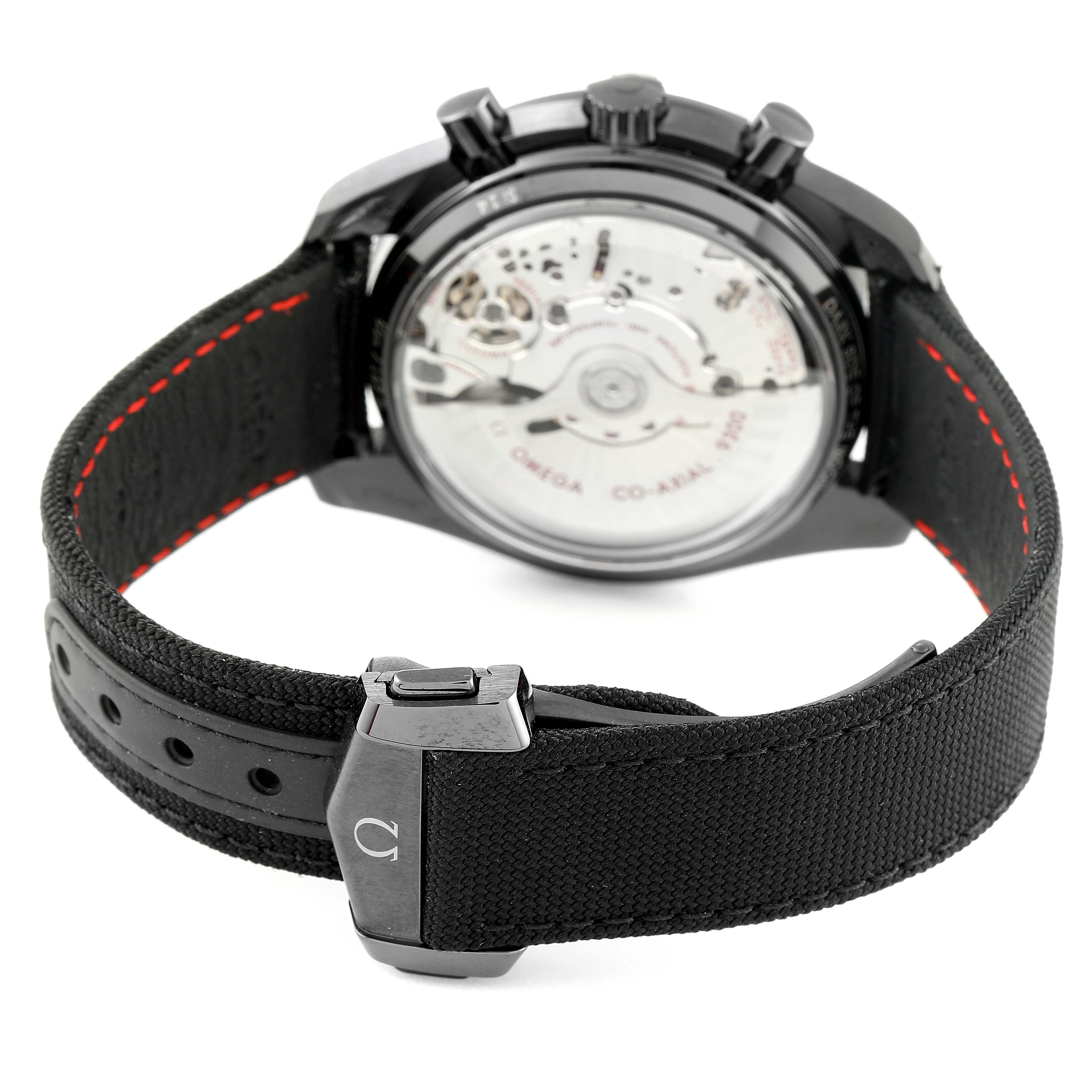 The image shows the back view of an Omega Speedmaster 311.92.44.51.01.005 Men's Ceramic Black Dial 311.92.44.51.01.005 Men's Ceramic Black Dial, highlighting its transparent case back and secured black strap.