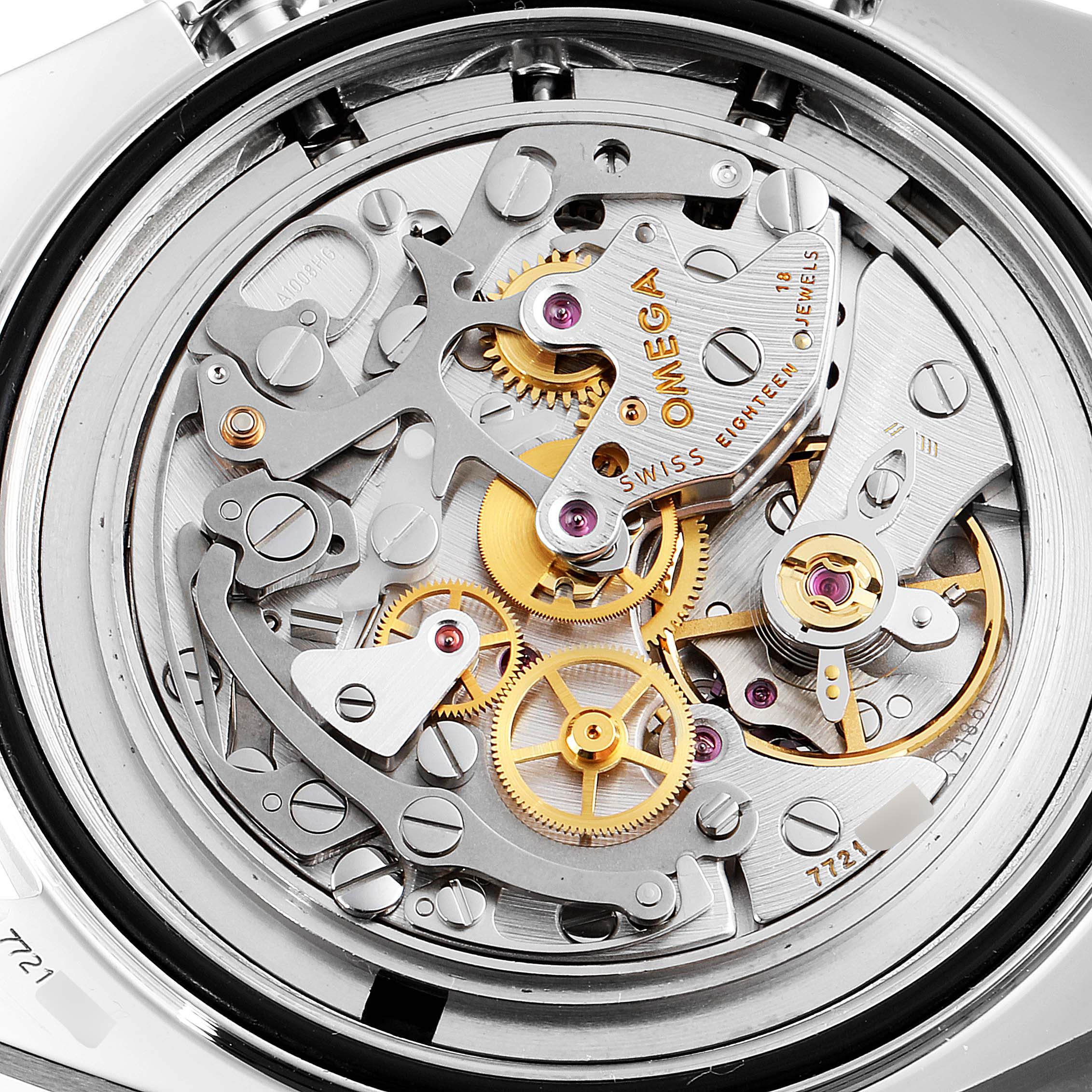 The image shows the intricate mechanical movement of the Omega Speedmaster 3570.50.00 Men
s Stainless Steel Black Dial 3570.50.00 Men
s Stainless Steel Black Dial watch from a close-up, top-down angle.