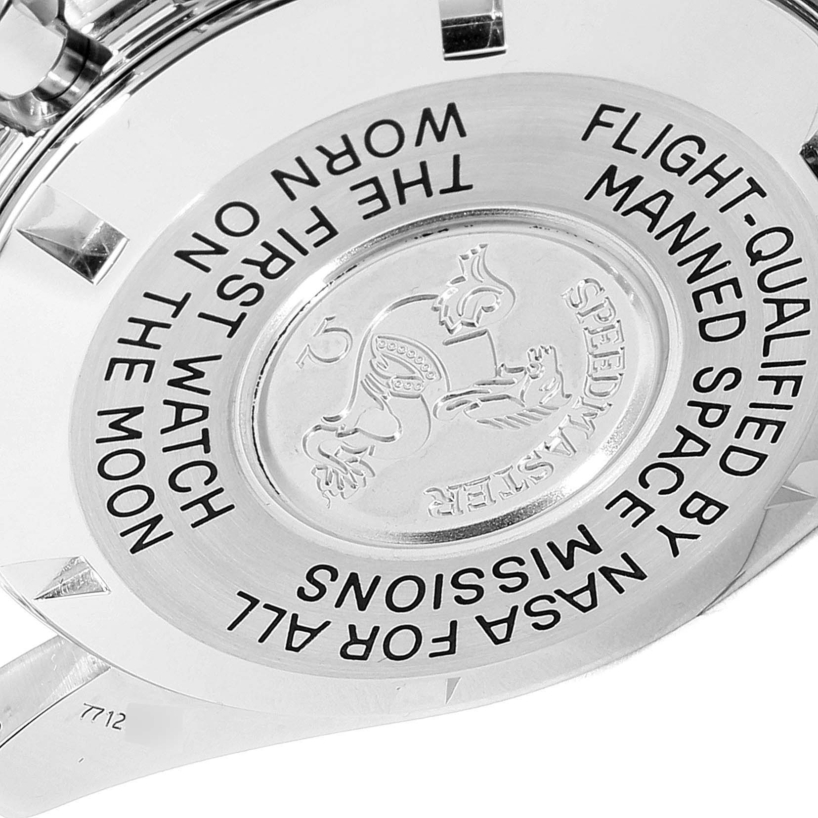 The image shows the back case of an Omega Speedmaster 3570.50.00 Men
s Stainless Steel Black Dial 3570.50.00 Men
s Stainless Steel Black Dial watch, featuring engraved text and emblem.